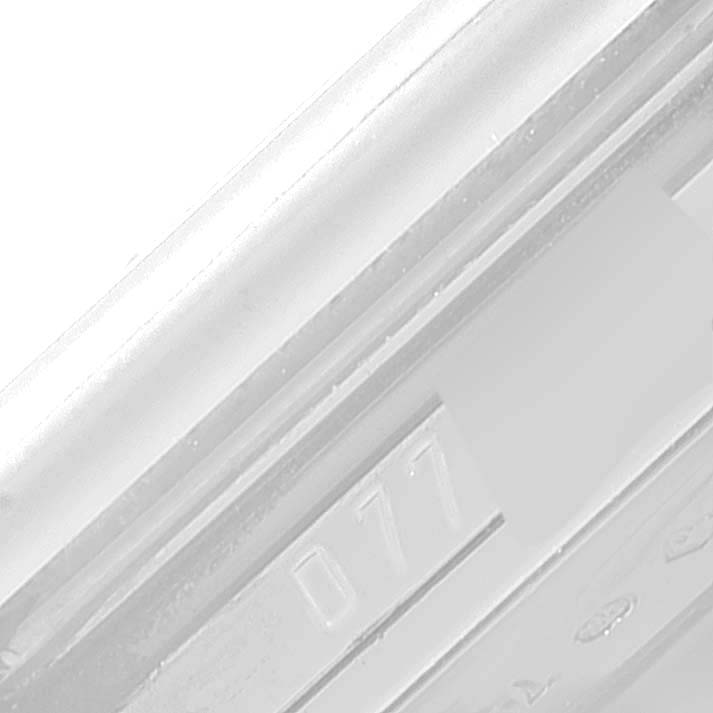 This image shows a close-up of the side of a Rolex Cellini 5443/9 Men
s White Gold Black Dial 5443/9 Men
s White Gold Black Dial watch, specifically focusing on its serial number area.