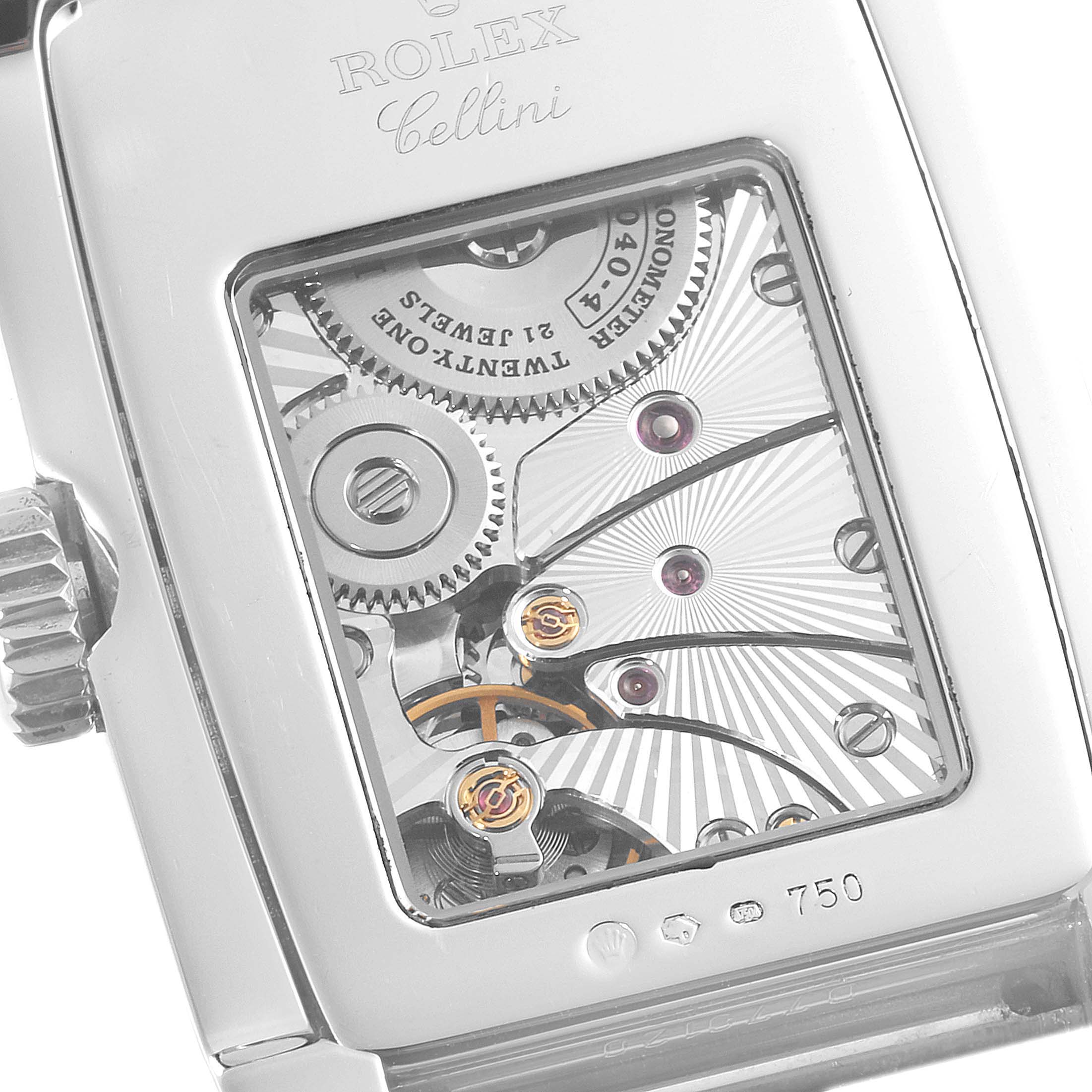 The image shows the back of a Rolex Cellini 5443/9 Men
s White Gold Black Dial 5443/9 Men
s White Gold Black Dial watch, highlighting its intricate movement and internal mechanics.