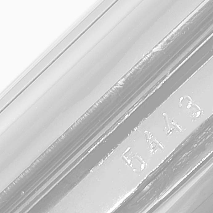 This image shows a close-up angle of the engraved number "5443" on a part of the Rolex Cellini 5443/9 Men
s White Gold Black Dial 5443/9 Men
s White Gold Black Dial watch.