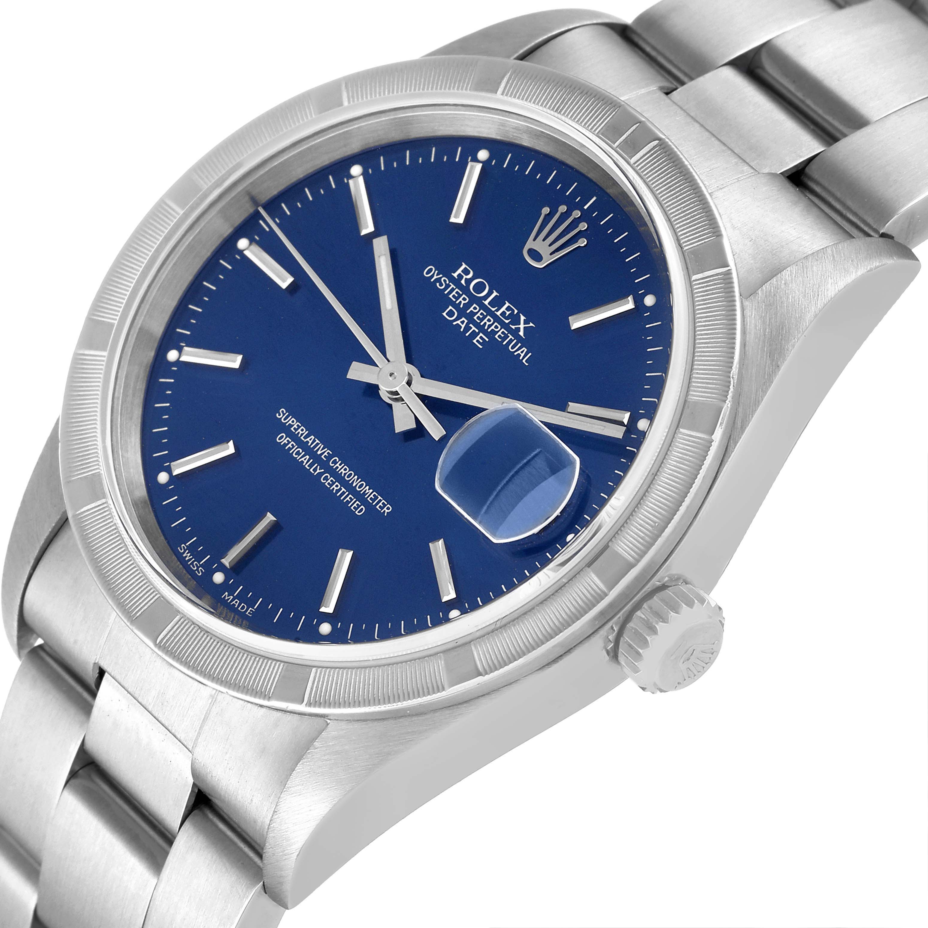 This image shows a Rolex Date 15210 Men's Stainless Steel Blue Dial 15210 Men's Stainless Steel Blue Dial watch at an angled close-up, highlighting its blue dial, date magnifier, and stainless steel bracelet.