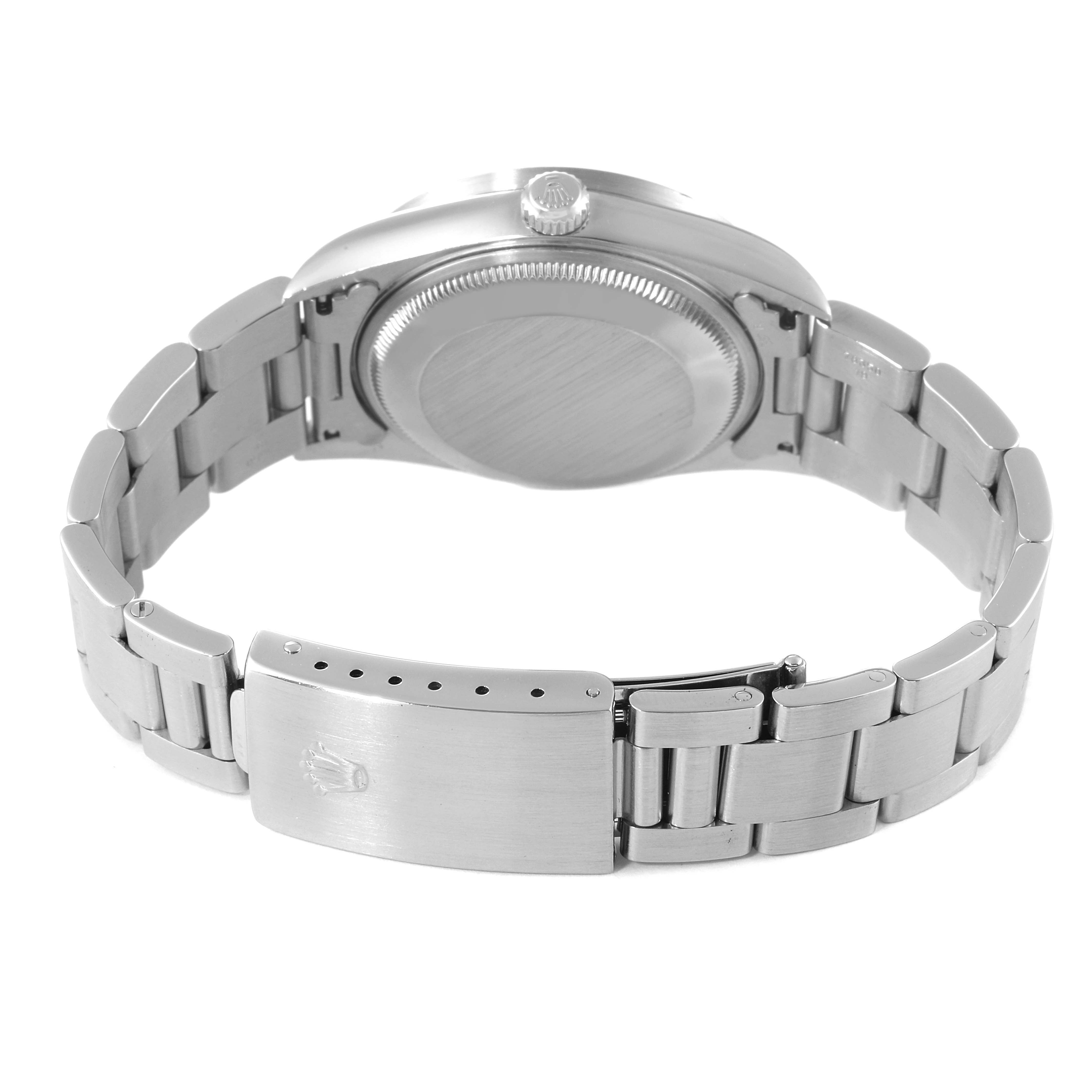 This image shows the back view of a Rolex Date 15210 Men's Stainless Steel Blue Dial 15210 Men's Stainless Steel Blue Dial model watch, highlighting its closed clasp and metal bracelet.