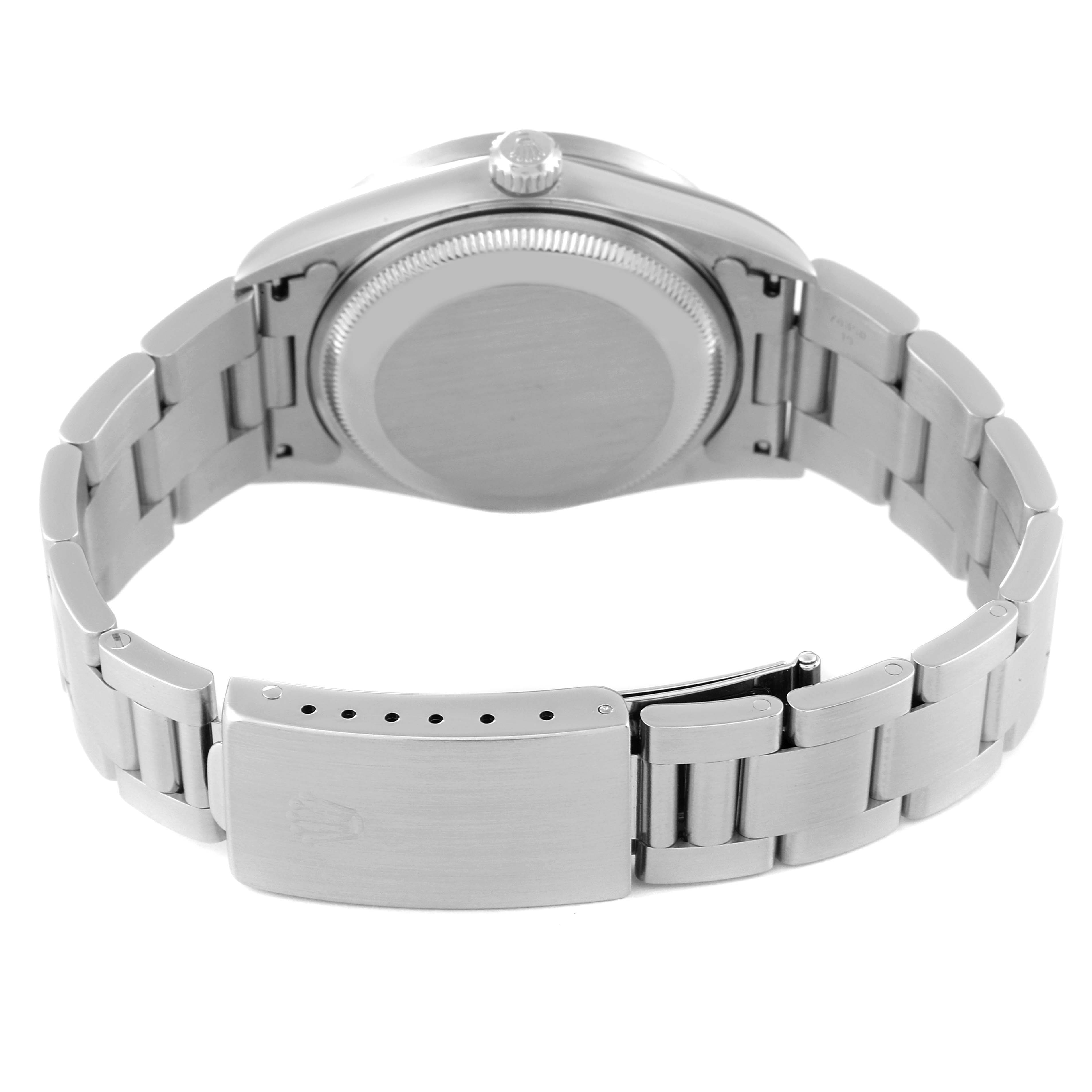 This is a rear view of a Rolex Date 15210 Men's Stainless Steel White Dial 15210 Men's Stainless Steel White Dial model watch, showing the underside of the case and the bracelet clasp.