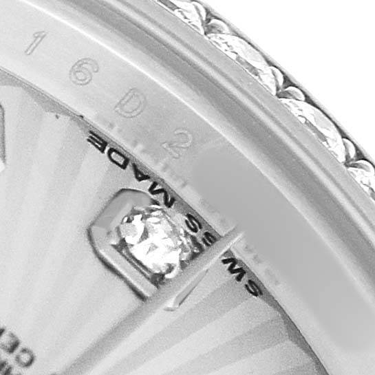 The image features a close-up of the dial and bezel of a Rolex Datejust 179384 Women's Stainless Steel Silver Dial, revealing a diamond marker and part of the "Swiss Made" text.