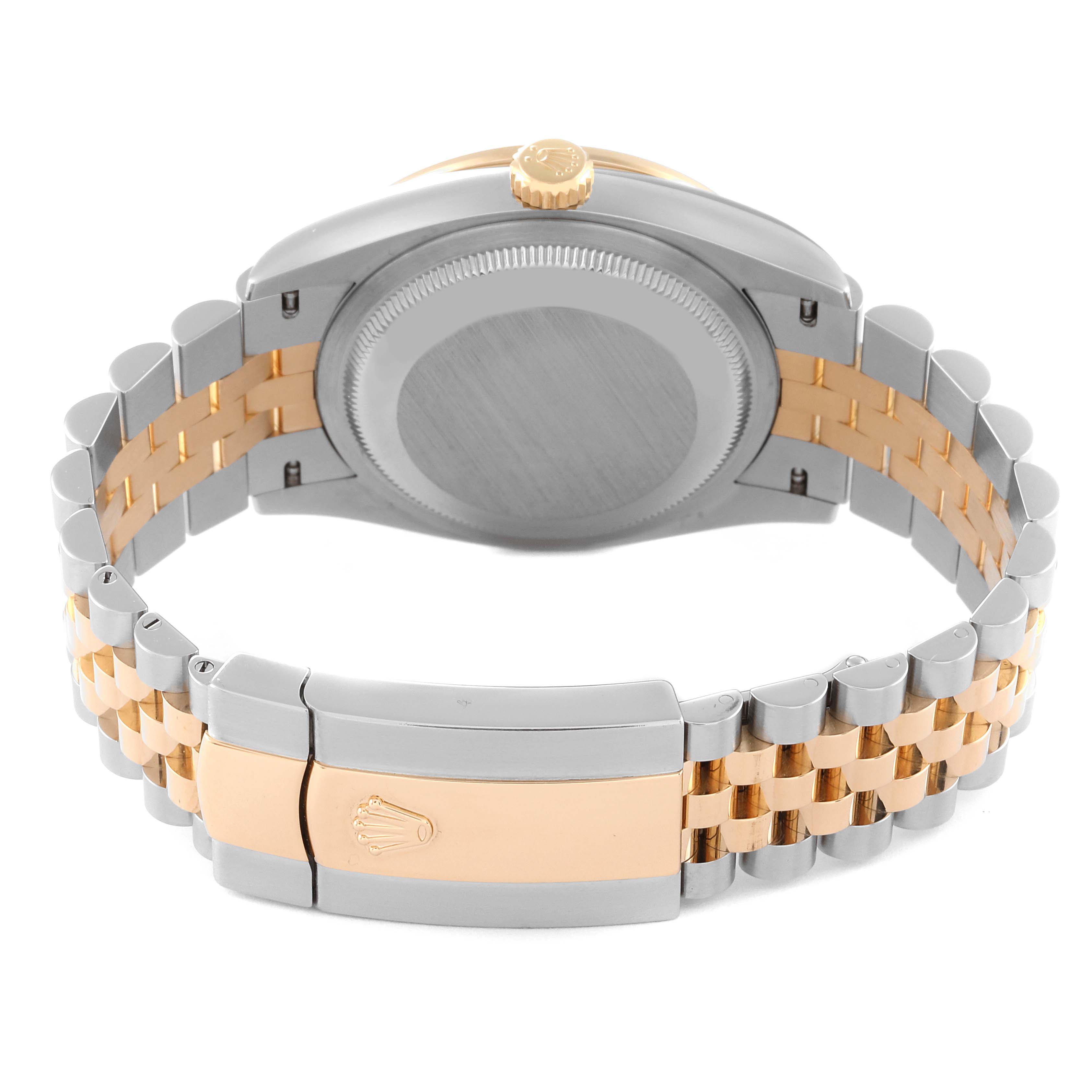 The image shows the back view of a Rolex Datejust 126283 Men's Steel and Gold (two tone) Mother of Pearl Dial 126283 Men's Steel and Gold (two tone) Mother of Pearl Dial watch, focusing on its caseback and two-tone bracelet with a clasp.