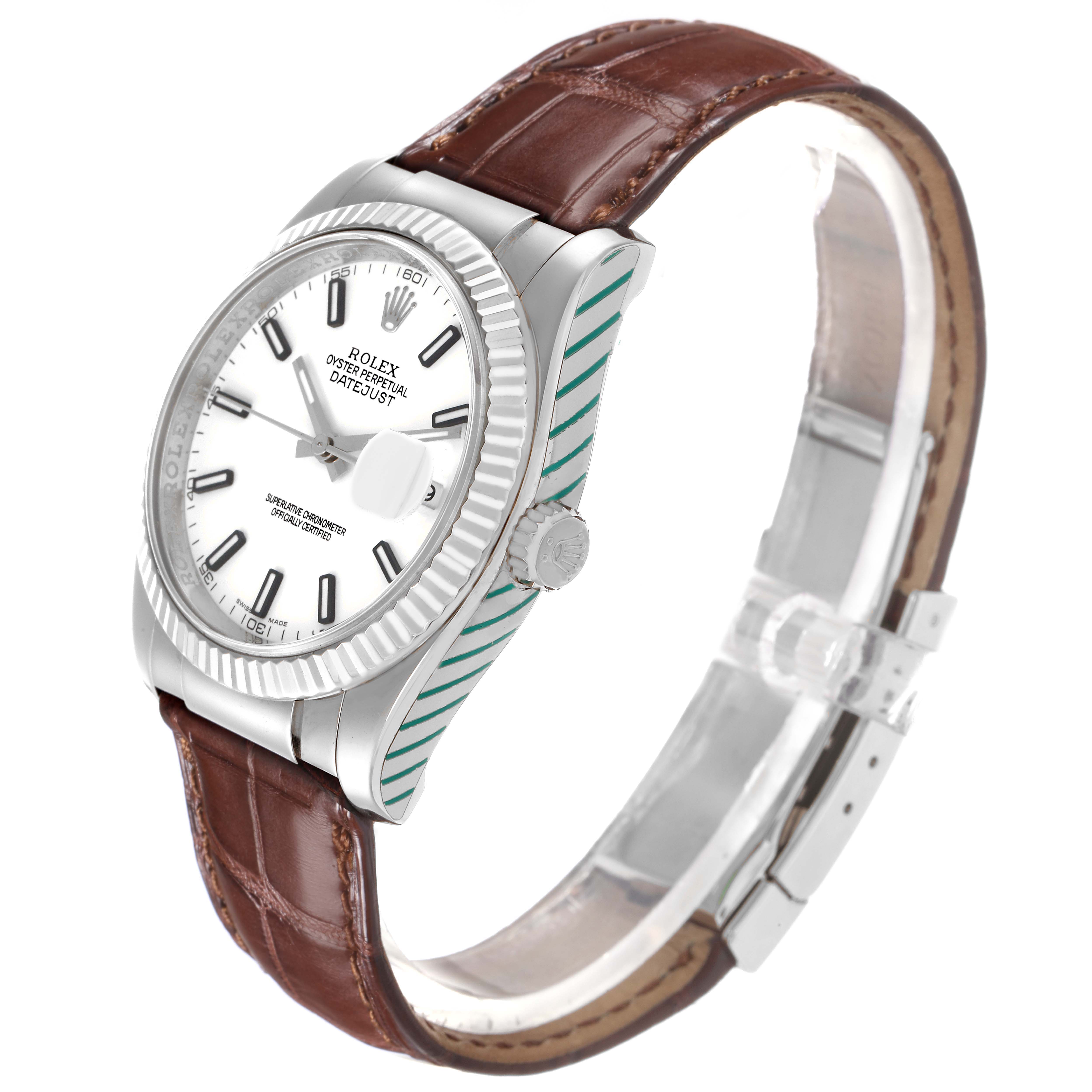 The Rolex Datejust 116139 Men's White Gold White Dial 116139 Men's White Gold White Dial watch is shown at a slight angle, highlighting its face, case, bezel, and brown leather strap.