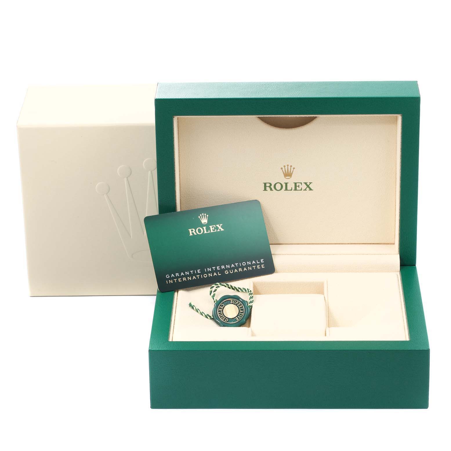 The image shows the packaging and guarantee card for the Rolex Datejust 41 126301 Men's Steel and Gold (two tone) Grey Dial 126301 Men's Steel and Gold (two tone) Grey Dial, including the green box and tag.