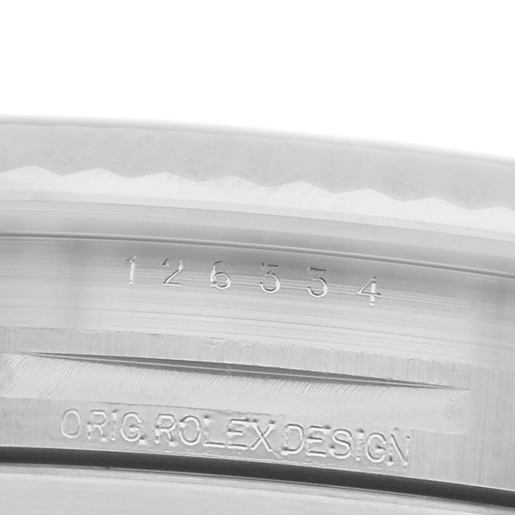 The image shows a close-up of the inner bezel with engravings on the Rolex Datejust 41 126334 Men
s Stainless Steel Grey Dial 126334 Men
s Stainless Steel Grey Dial watch.