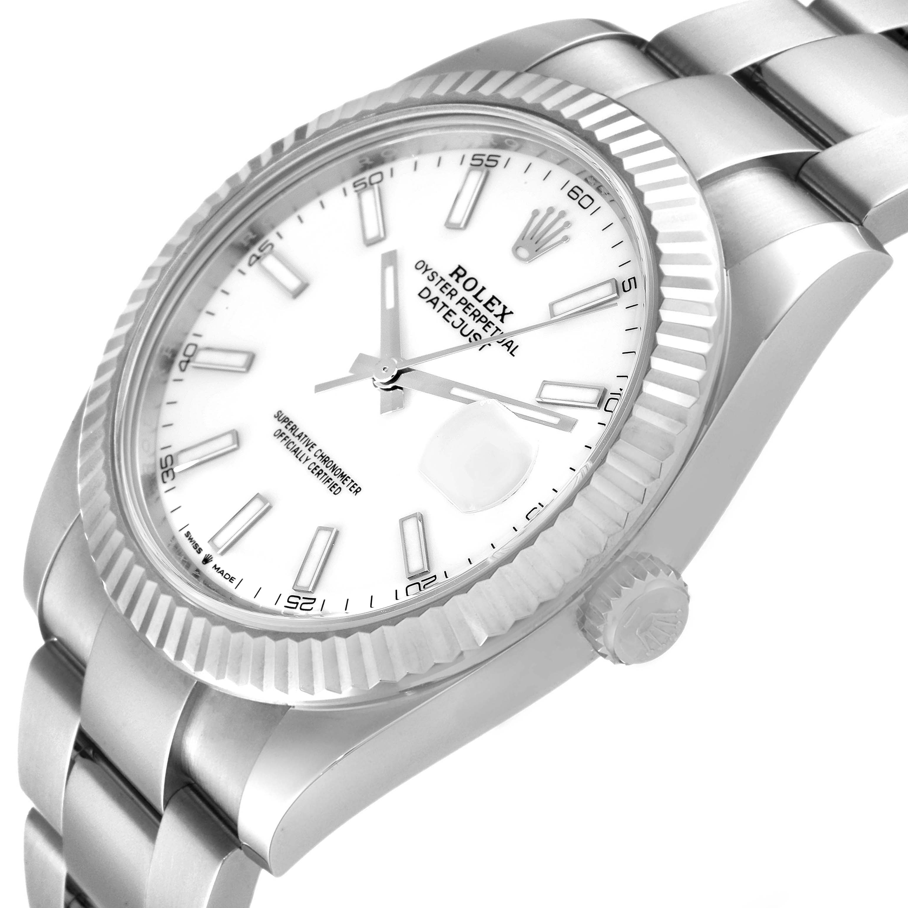 The image shows a close-up, angled view of a Rolex Datejust 41 126334 Men's Stainless Steel White Dial 126334 Men's Stainless Steel White Dial watch, highlighting the white dial, fluted bezel, and partial bracelet.