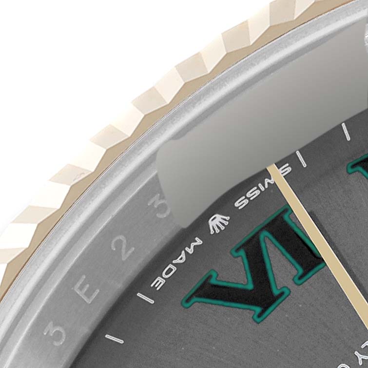 The image shows a close-up angle of the dial, bezel, and part of the minute hand of a Rolex Datejust 41 126333 Men's Steel and Gold (two tone) Grey Dial 126333 Men's Steel and Gold (two tone) Grey Dial watch.