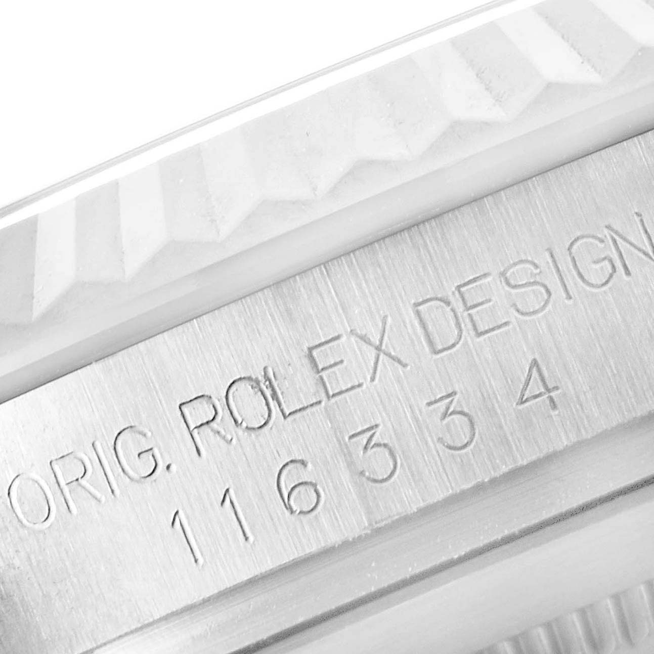 The image shows a close-up of the engraved model and serial number on the side of a Rolex Datejust 41 116334 Men's Stainless Steel White Dial 116334 Men's Stainless Steel White Dial watch case.