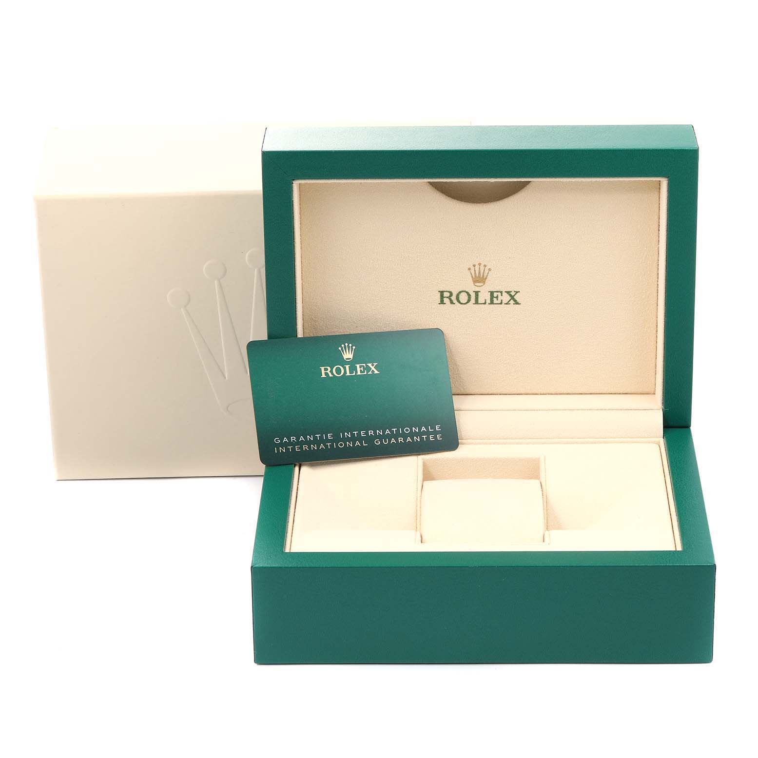 A Rolex Mid-Size 278240 Women's Stainless Steel Green Dial 278240 Women's Stainless Steel Green Dial watch box is displayed open, showing the inner compartment and an international guarantee card.