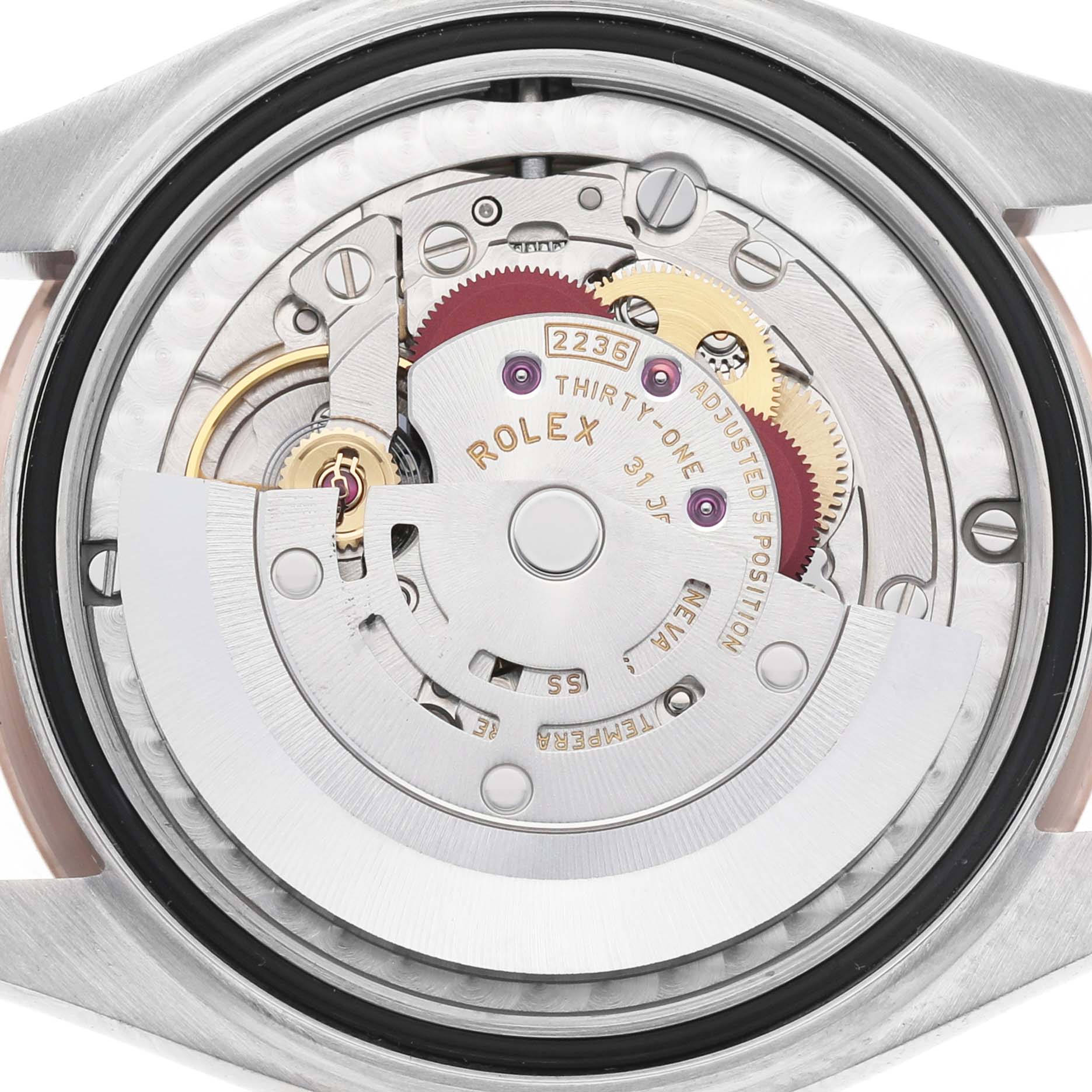 The image shows the movement mechanism of a Rolex Datejust 278241 Women's Steel and Gold (two tone) White Dial watch, viewed from the back with components like rotors and gears visible.