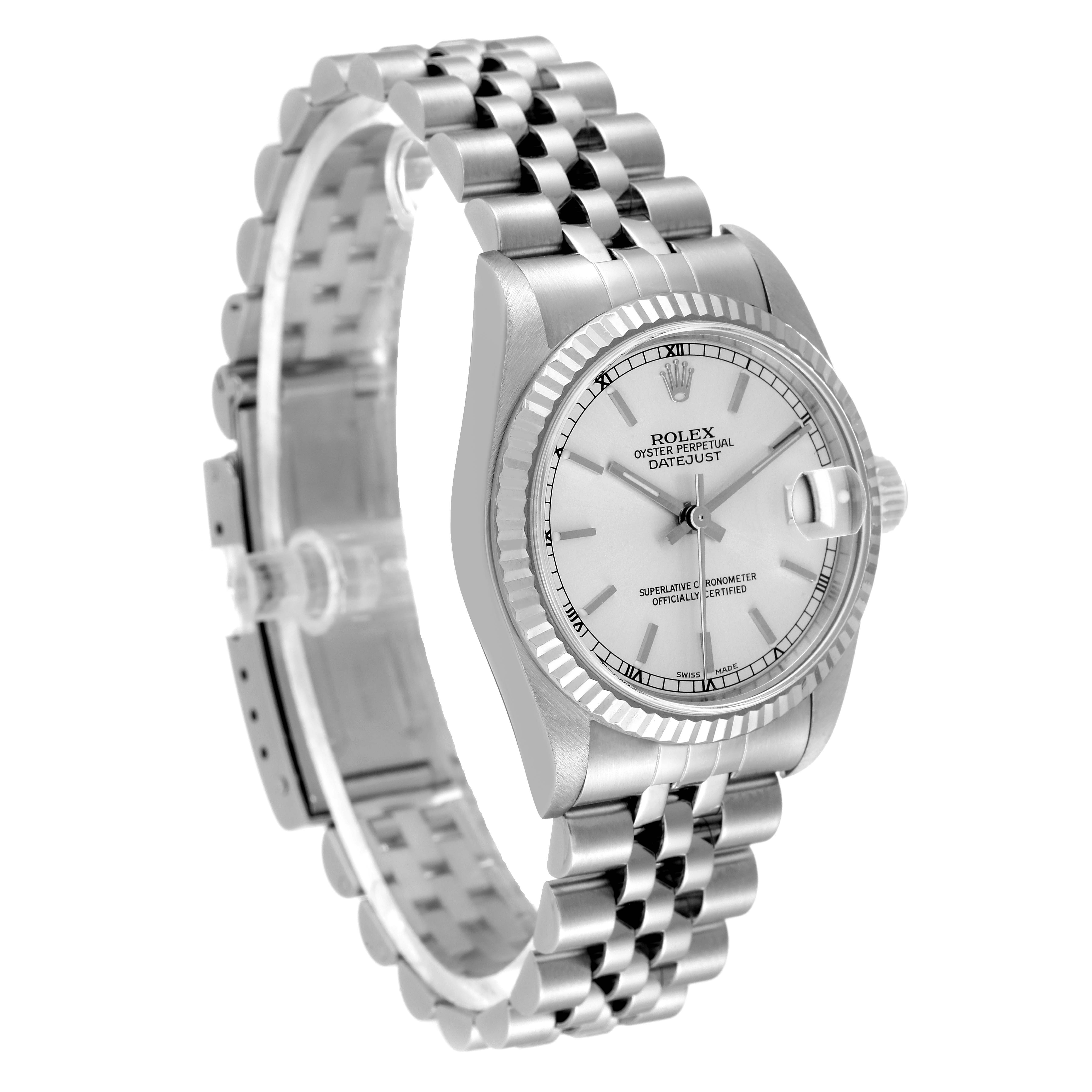 This image shows a Rolex Mid-Size 78274 Women
s Stainless Steel Silver Dial 78274 Women
s Stainless Steel Silver Dial Datejust watch at a three-quarter angle, highlighting its face, bezel, and bracelet.