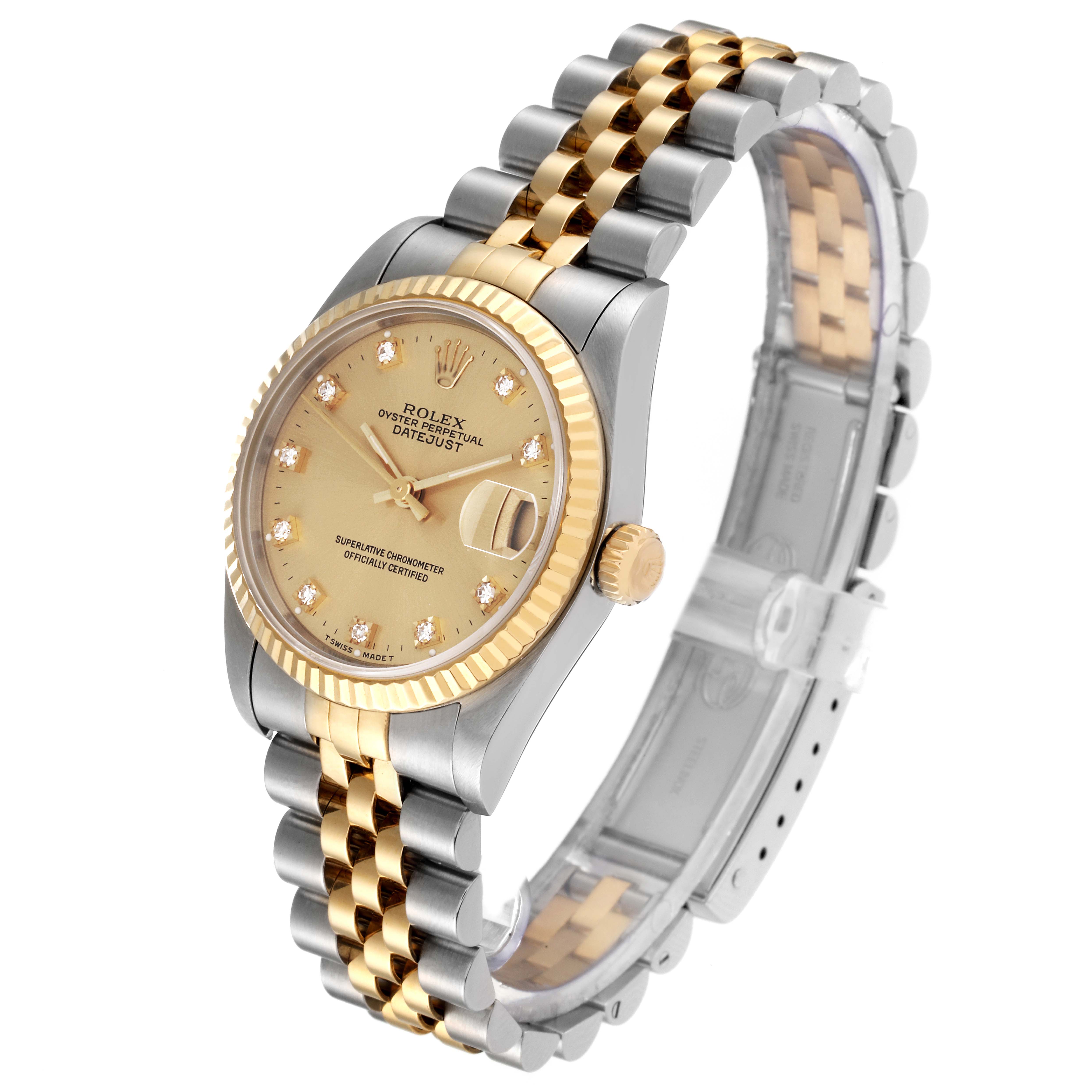 The image shows a Rolex Mid-Size 68273 Women's Steel and Gold (two tone) Champagne Dial 68273 Women's Steel and Gold (two tone) Champagne Dial Datejust watch angled to display the face, bezel, crown, and bracelet.