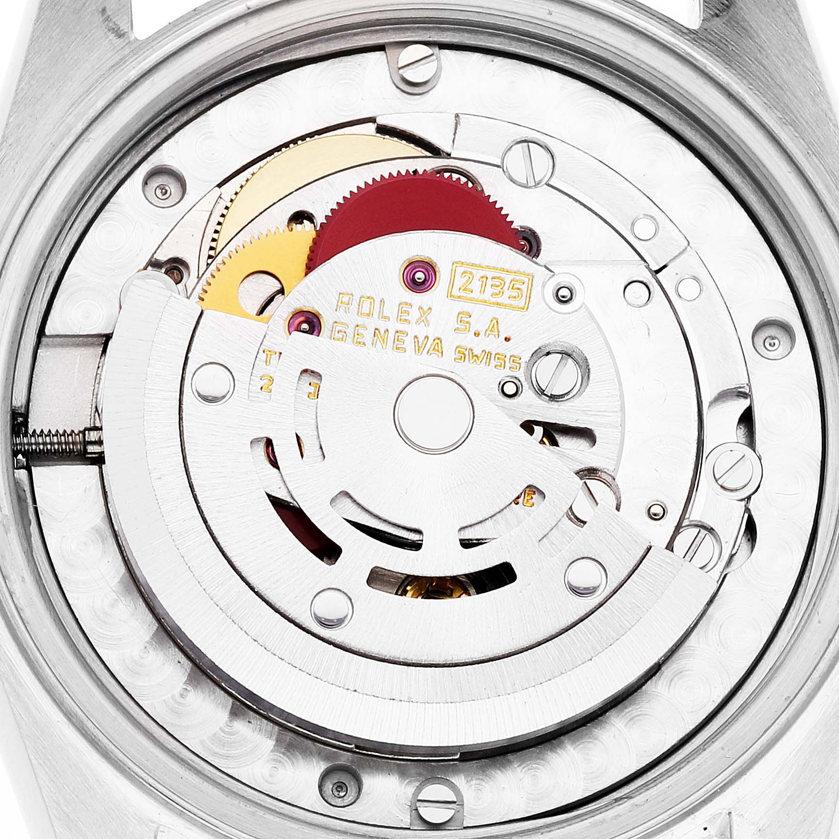 This image shows the internal movement of a mid-size Rolex watch, including gears and the rotor, viewed from the back.