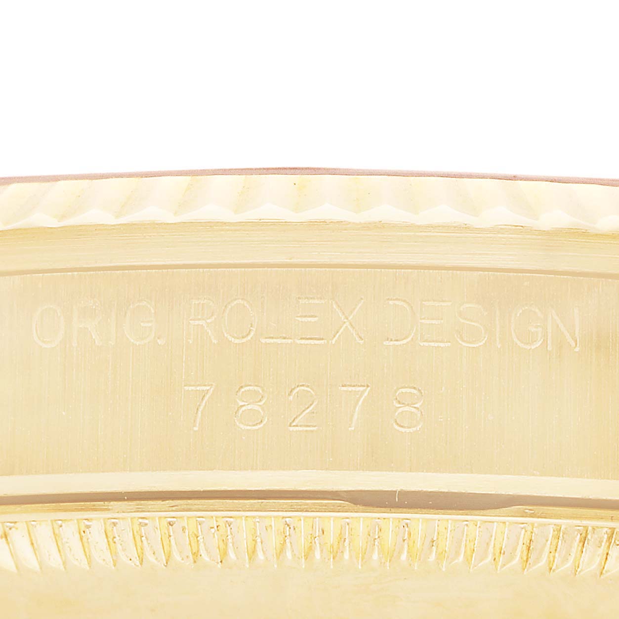 The image shows a close-up of the case side of a Rolex Datejust 78278 Women's Yellow Gold Champagne Dial, displaying the engraving "ORIG. ROLEX DESIGN" and "78278".