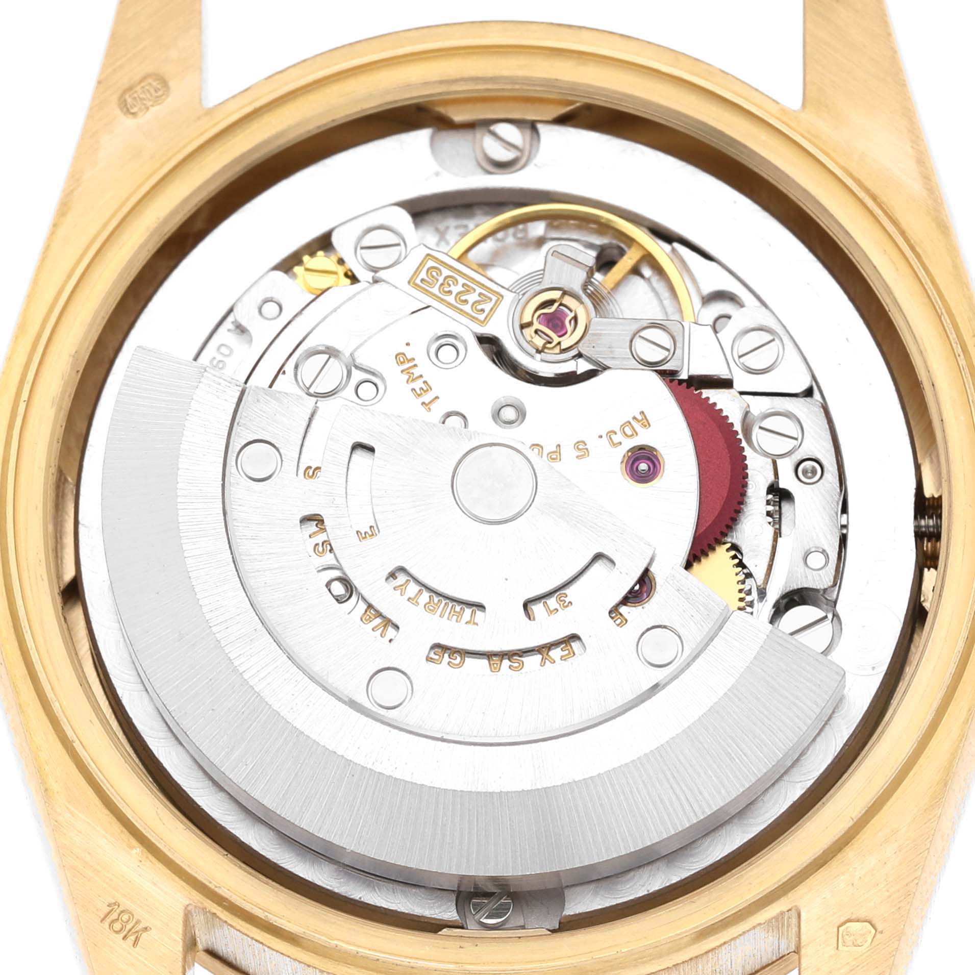 The image shows a close-up view of the movement inside a Rolex Datejust 78278 Women's Yellow Gold Champagne Dial, highlighting the rotor and internal components.