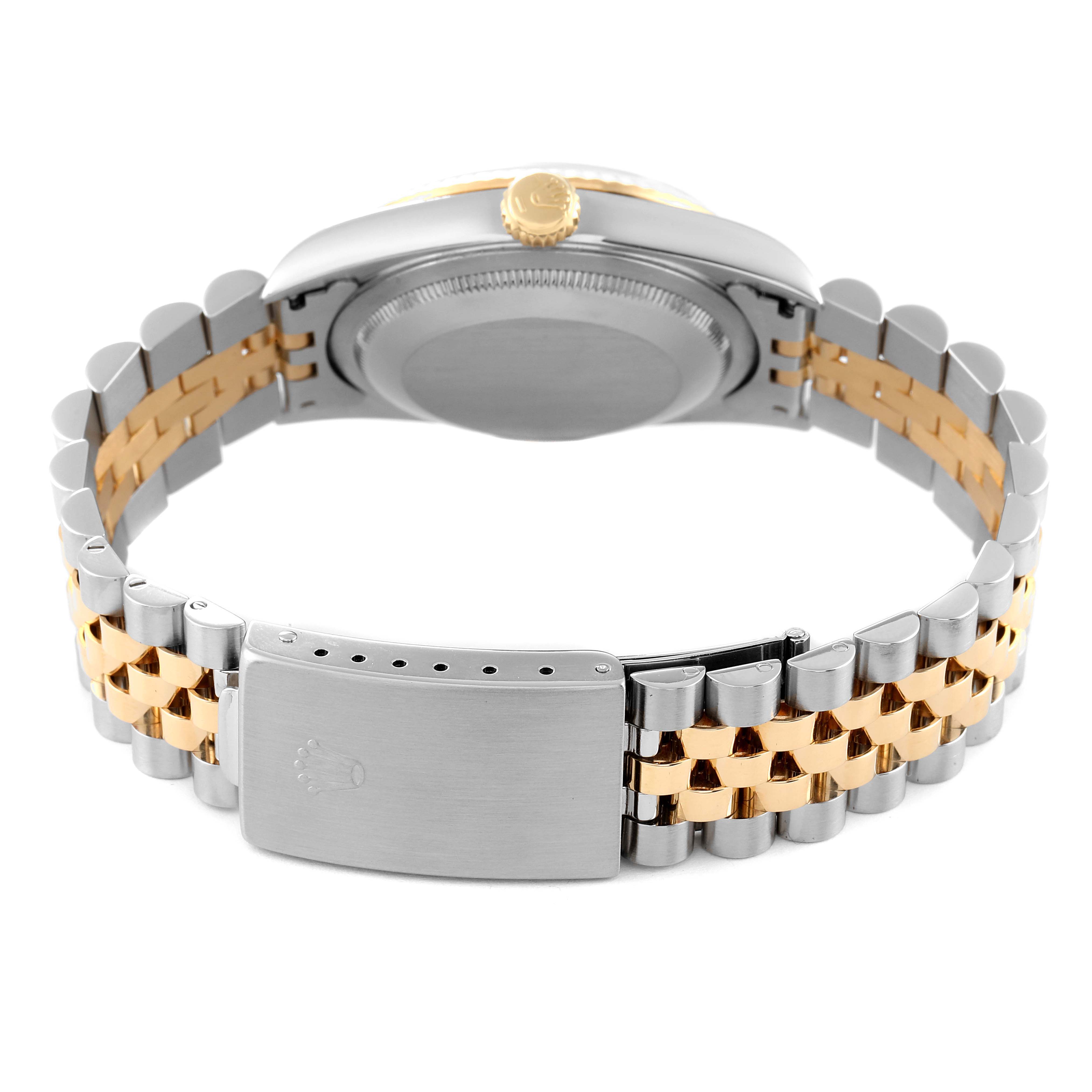 The image shows the back view of a Rolex Datejust 16233 Men's Steel and Gold (two tone) Champagne Dial 16233 Men's Steel and Gold (two tone) Champagne Dial watch, highlighting the closed clasp, bracelet, and caseback.