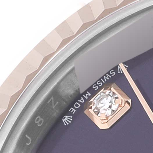The image shows a close-up of the dial and bezel of a Rolex Datejust 279171 Women's Rose Gold Purple Dial 279171 Women's Rose Gold Purple Dial watch, highlighting a diamond hour marker and the "Swiss Made" text.