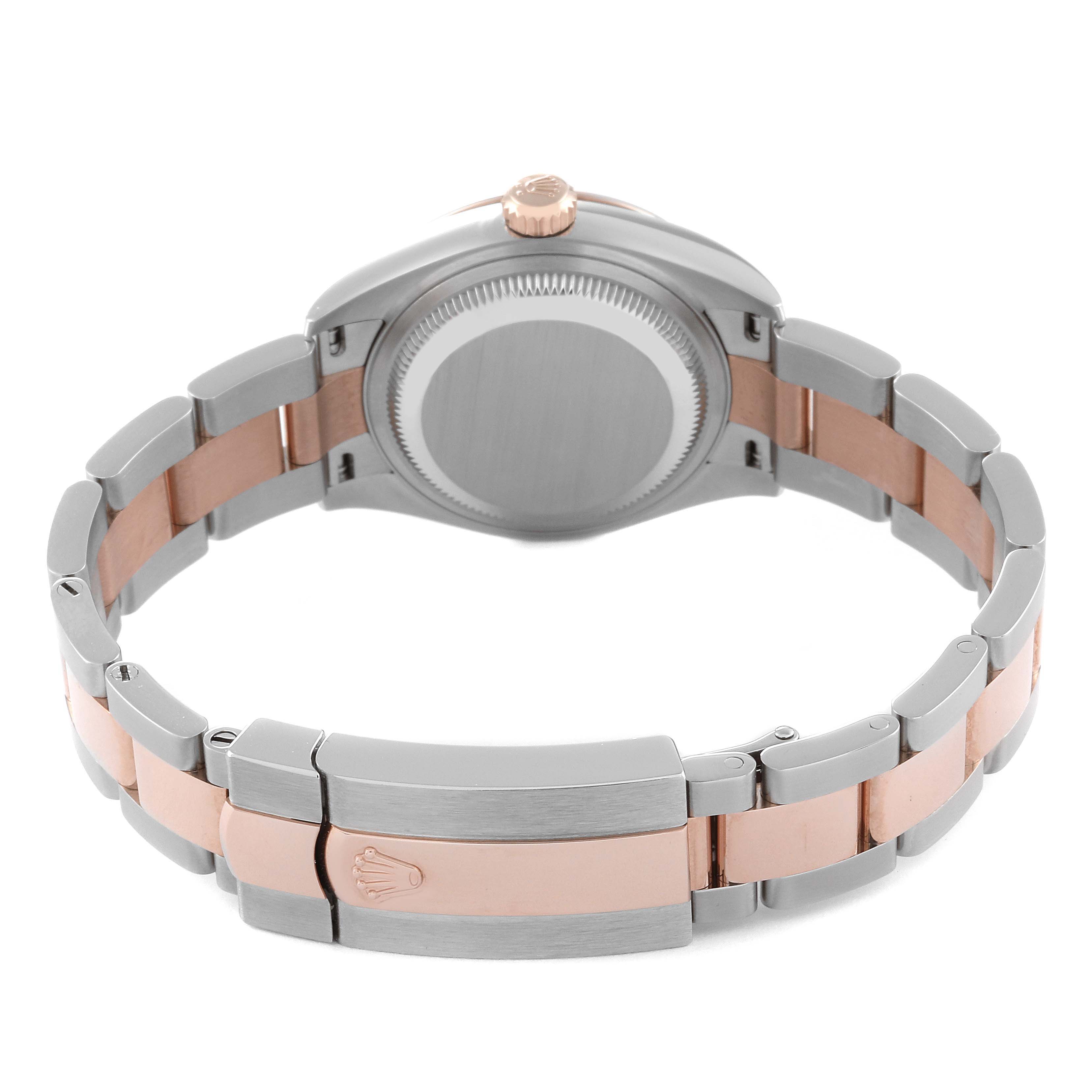 The image shows the back of a Rolex Datejust 279171 Women's Rose Gold Purple Dial 279171 Women's Rose Gold Purple Dial watch, highlighting its two-tone bracelet and caseback.