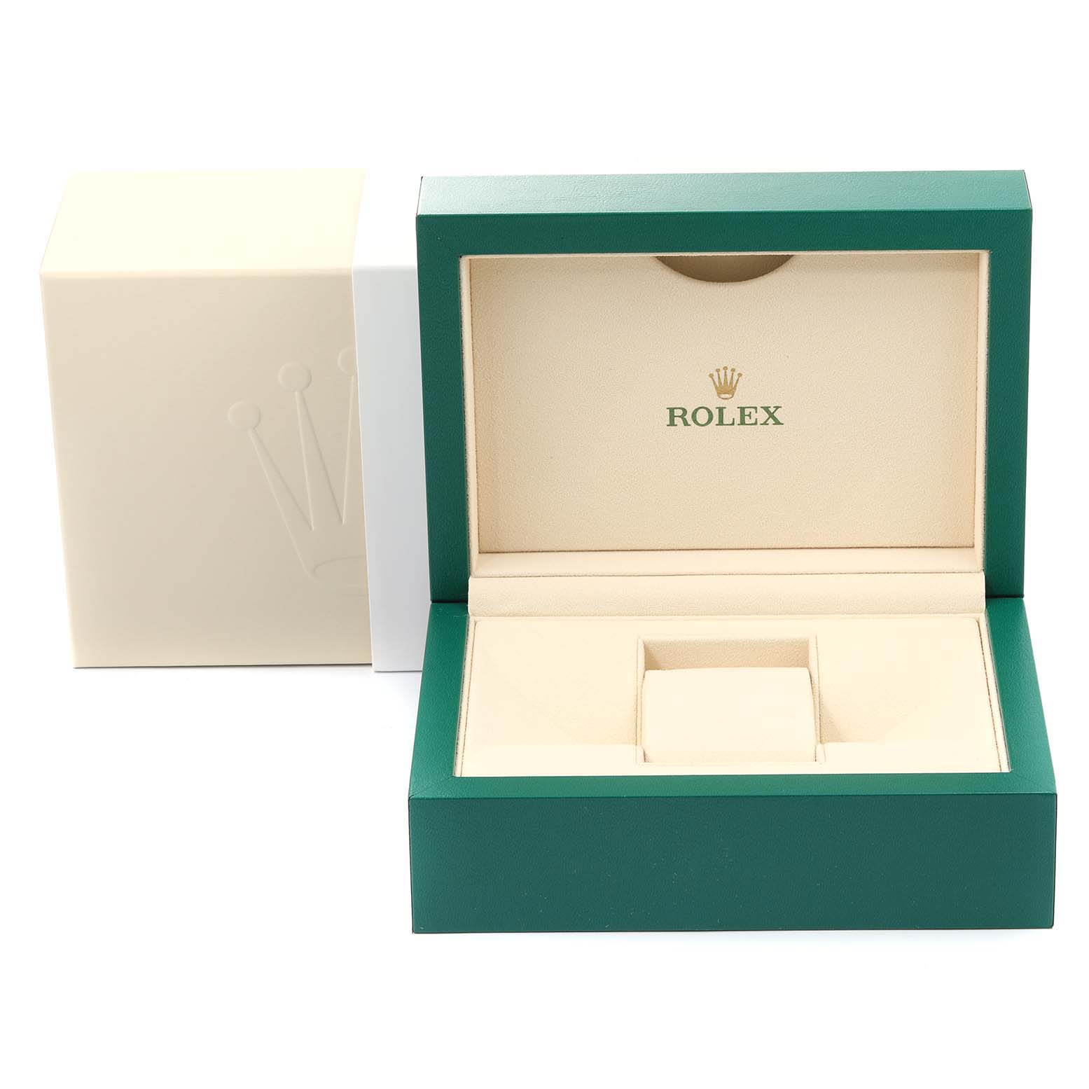 The image shows an open Rolex Datejust 116234 Men's Stainless Steel Blue Dial 116234 Men's Stainless Steel Blue Dial watch box, featuring a green exterior and cream interior.