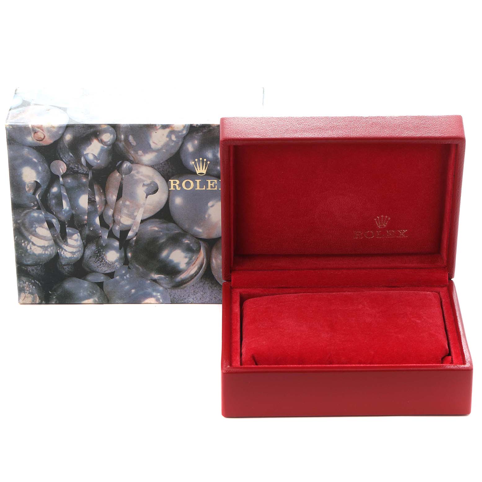 The image shows an open Rolex Datejust 79173 Women
s Steel and Gold (two tone) Black Dial 79173 Women
s Steel and Gold (two tone) Black Dial box with a cushion, placed next to its decorative outer box.