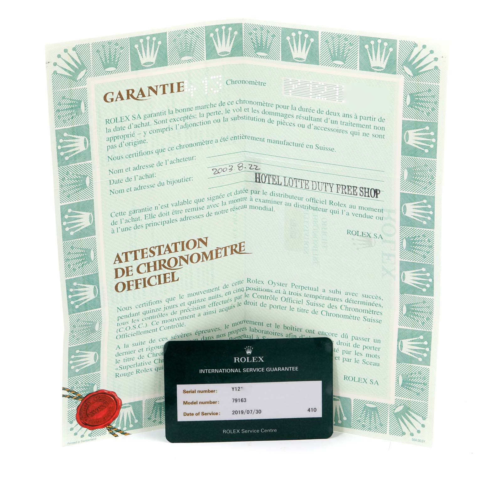 The image shows the official chronometer certification and international service guarantee for a Datejust model by Rolex.