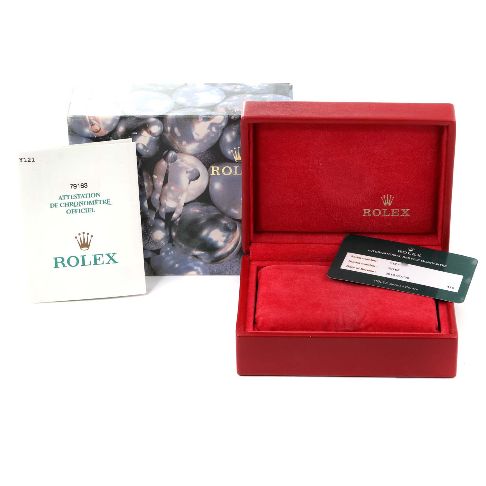 The image shows an opened Rolex Datejust 79163 Women's Steel and Gold (two tone) Grey Dial 79163 Women's Steel and Gold (two tone) Grey Dial watch box with an instruction manual, service guarantee card, and outer box.