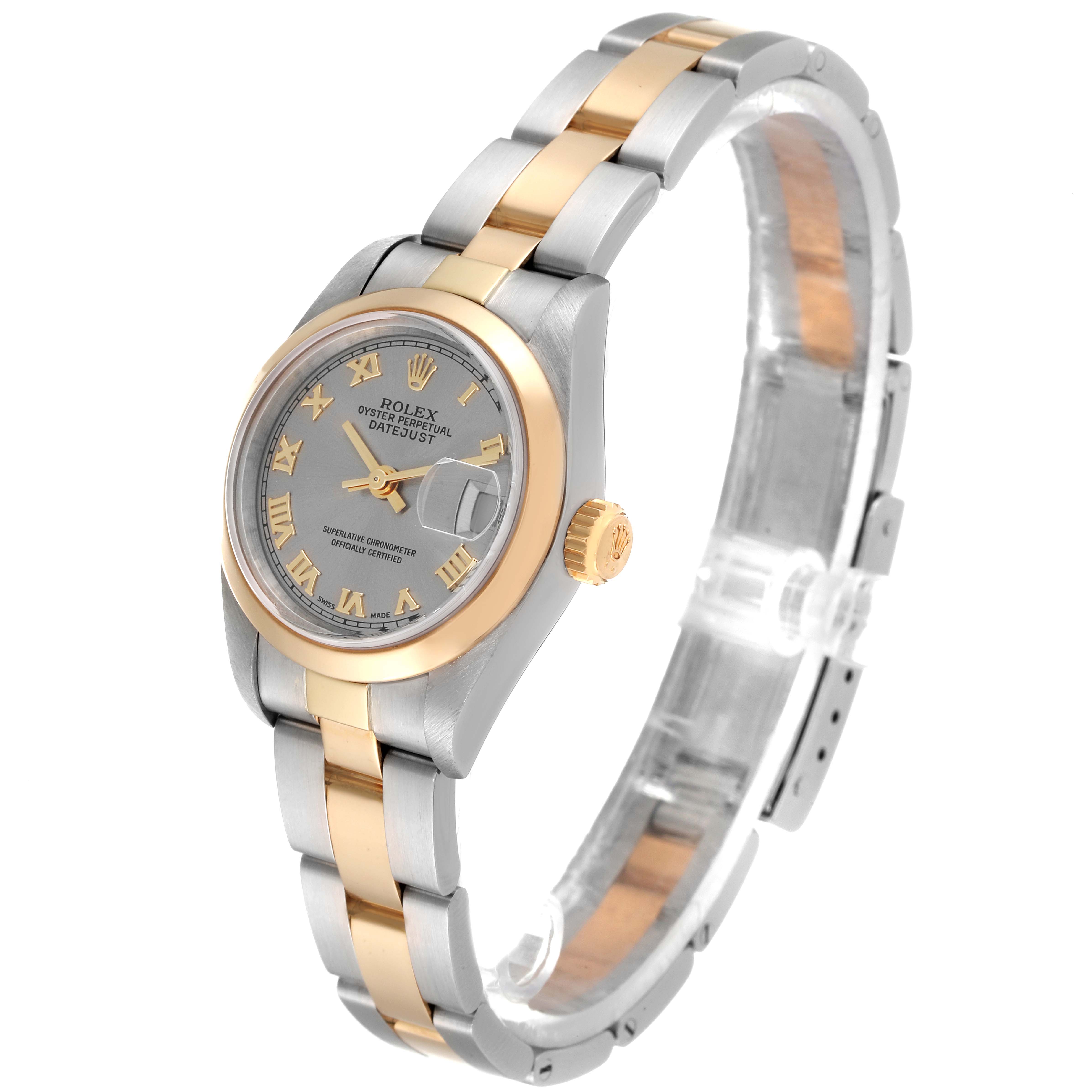 The Rolex Datejust 79163 Women's Steel and Gold (two tone) Grey Dial 79163 Women's Steel and Gold (two tone) Grey Dial watch is shown from a three-quarter angle, highlighting the dial, bezel, case, and bracelet.