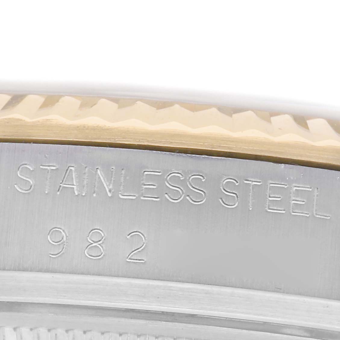 The image shows a close-up of the stainless steel case and engraved model number of the Rolex Vintage Collection 16013 Men
s Steel and Gold (two tone) Champagne Dial 16013 Men
s Steel and Gold (two tone) Champagne Dial watch.