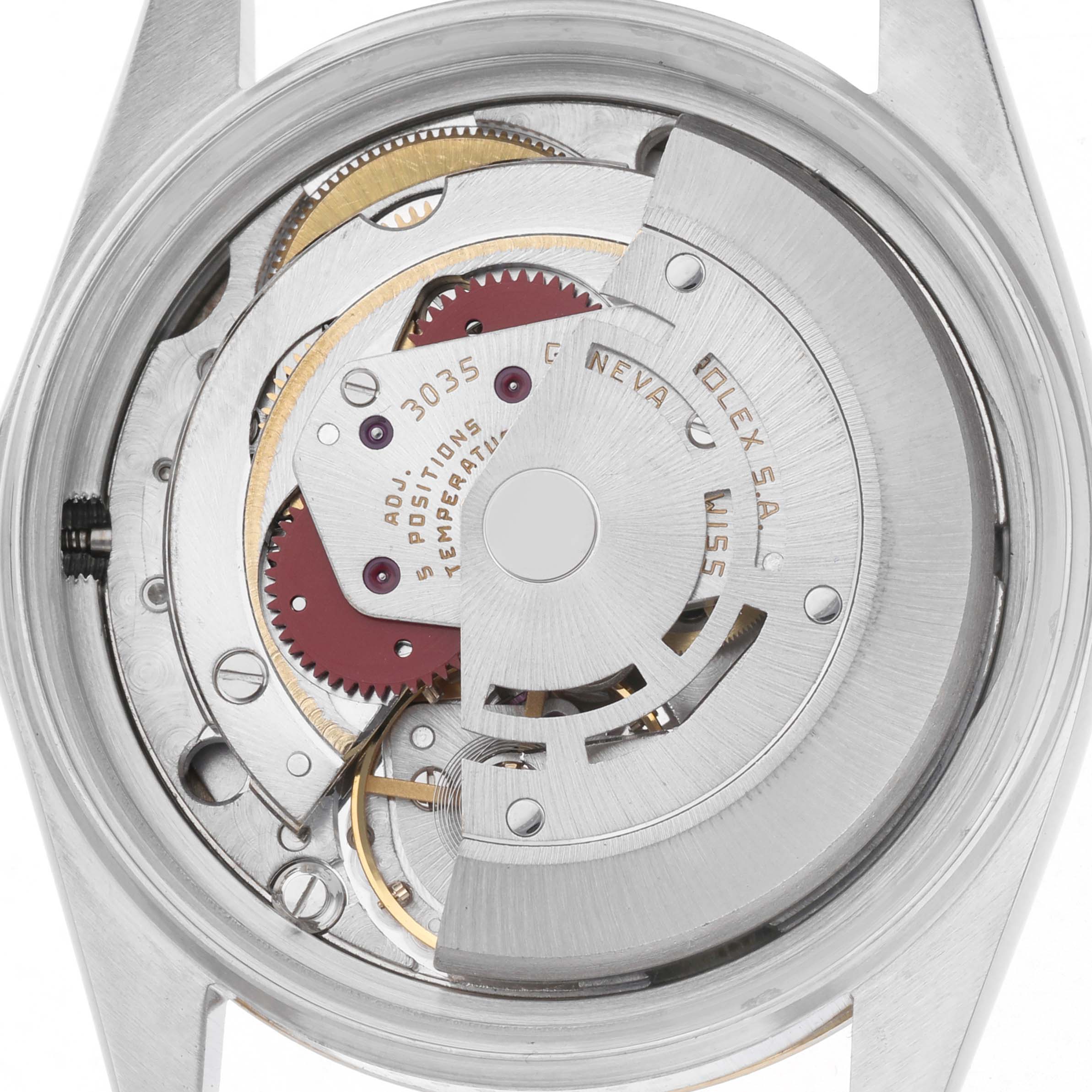 The image shows the inner movement mechanism of a Rolex Vintage Collection 16013 Men
s Steel and Gold (two tone) Champagne Dial 16013 Men
s Steel and Gold (two tone) Champagne Dial model from a rear angle.