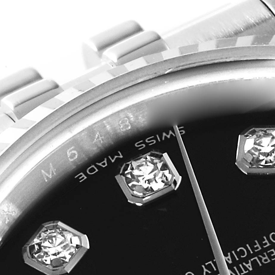 The image shows a close-up angle of the dial and part of the bracelet of a Rolex Datejust 179174 Women's Stainless Steel Black Dial 179174 Women's Stainless Steel Black Dial watch, highlighting the diamond markers.