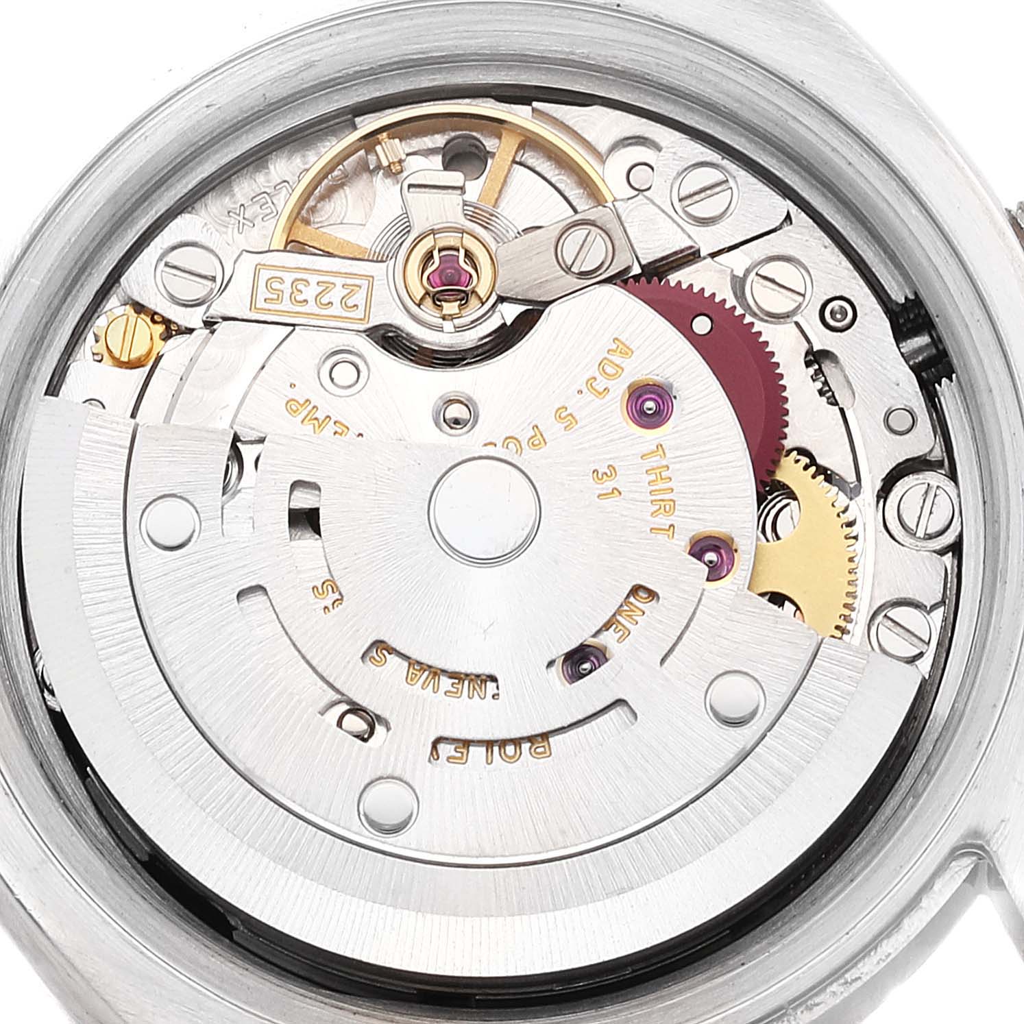 This image shows an up-close view of the inner movement mechanism of a Rolex Datejust 179174 Women's Stainless Steel Black Dial 179174 Women's Stainless Steel Black Dial watch.