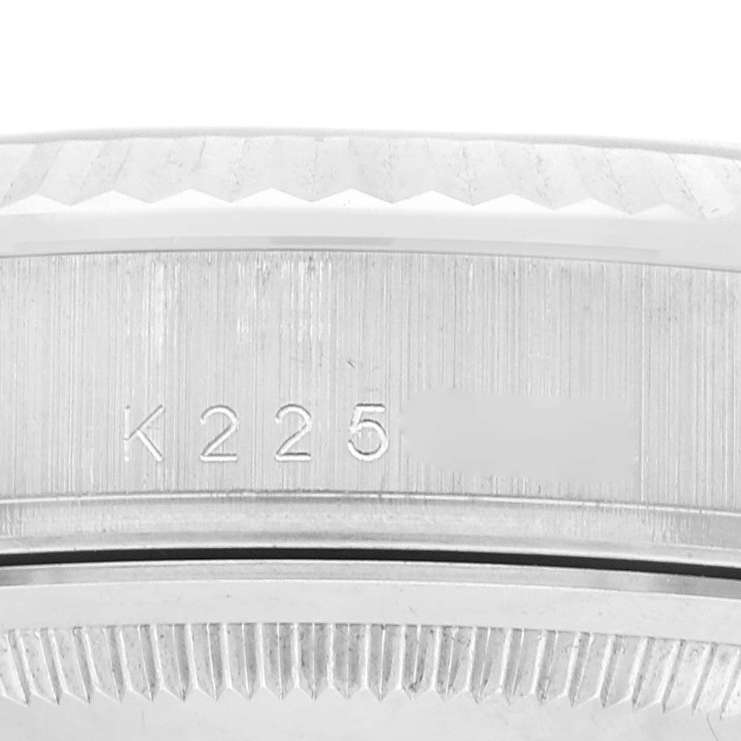 This image shows a close-up of the serial number on the side of the Rolex President 118239 Men's White Gold Silver Dial 118239 Men's White Gold Silver Dial model watch case.