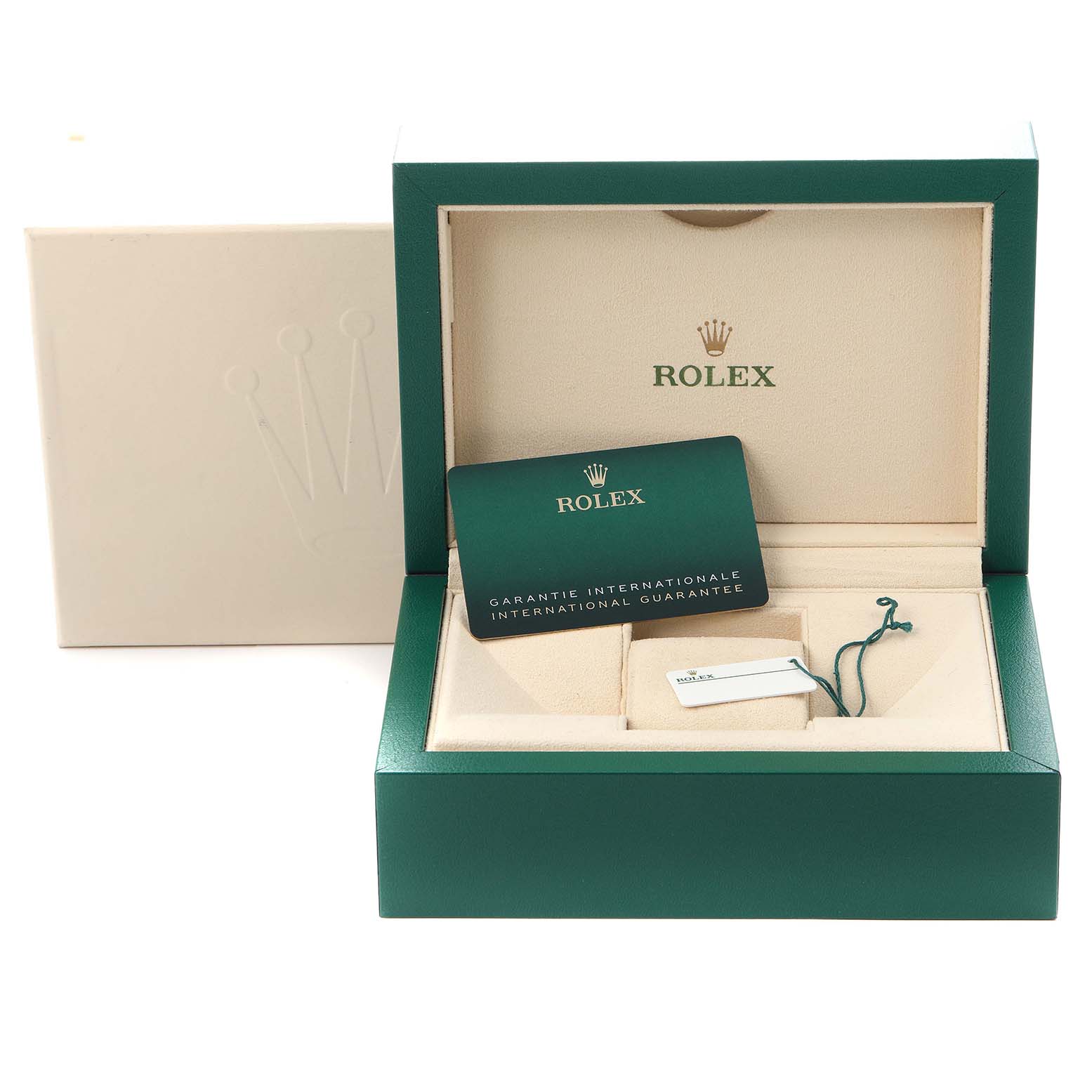 The image shows a Rolex Daytona 116503 Men
s Steel and Gold (two tone) Mother of Pearl Dial 116503 Men
s Steel and Gold (two tone) Mother of Pearl Dial watch box and accessories, including a guarantee card and a tag, viewed from the front.