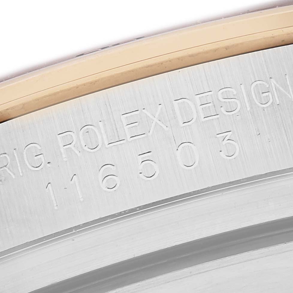 The image shows a close-up of the engraved model number on the Rolex Daytona 116503 Men
s Steel and Gold (two tone) Mother of Pearl Dial 116503 Men
s Steel and Gold (two tone) Mother of Pearl Dial
s casing.