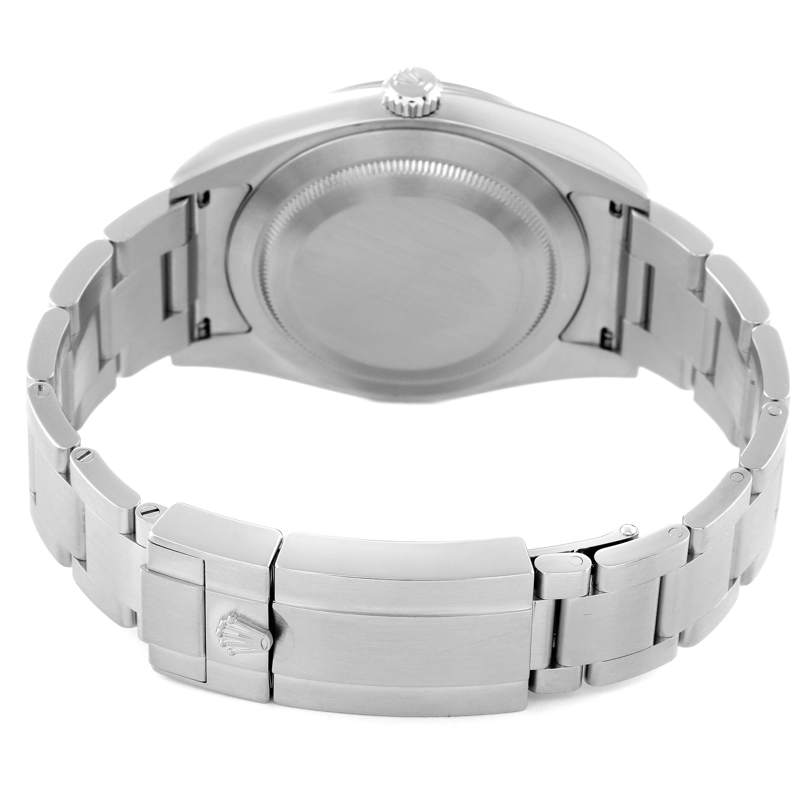 The image shows the back view of a Rolex Explorer 214270 Men
s Stainless Steel Black Dial 214270 Men
s Stainless Steel Black Dial watch, focusing on the case back and the stainless steel bracelet.