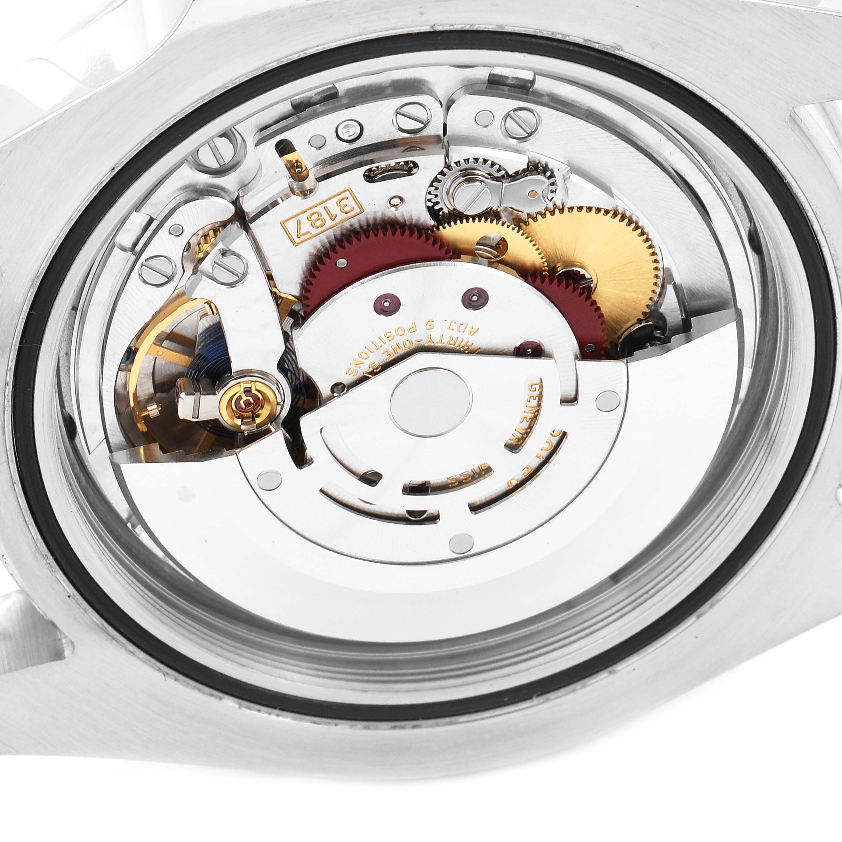 The image shows the back side of a Rolex Explorer 216570 Men's Stainless Steel Black Dial 216570 Men's Stainless Steel Black Dial watch, revealing its exposed movement mechanism and intricate internal components.