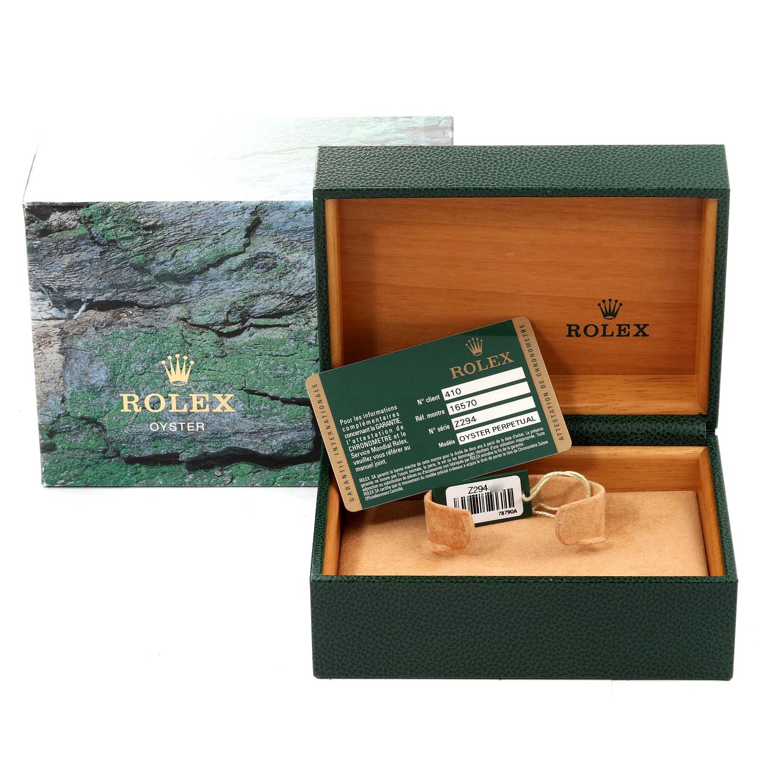 The image shows a Rolex Explorer 16570 Men
s Stainless Steel Black Dial 16570 Men
s Stainless Steel Black Dial model
s open green and wood watch box, warranty card, and bracelet tag.