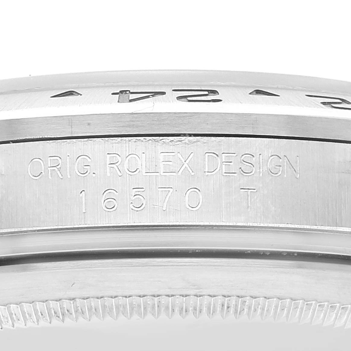 The image shows a close-up of the case side and bezel of a Rolex Explorer 16570 Men
s Stainless Steel Black Dial 16570 Men
s Stainless Steel Black Dial model, featuring engraved model details.