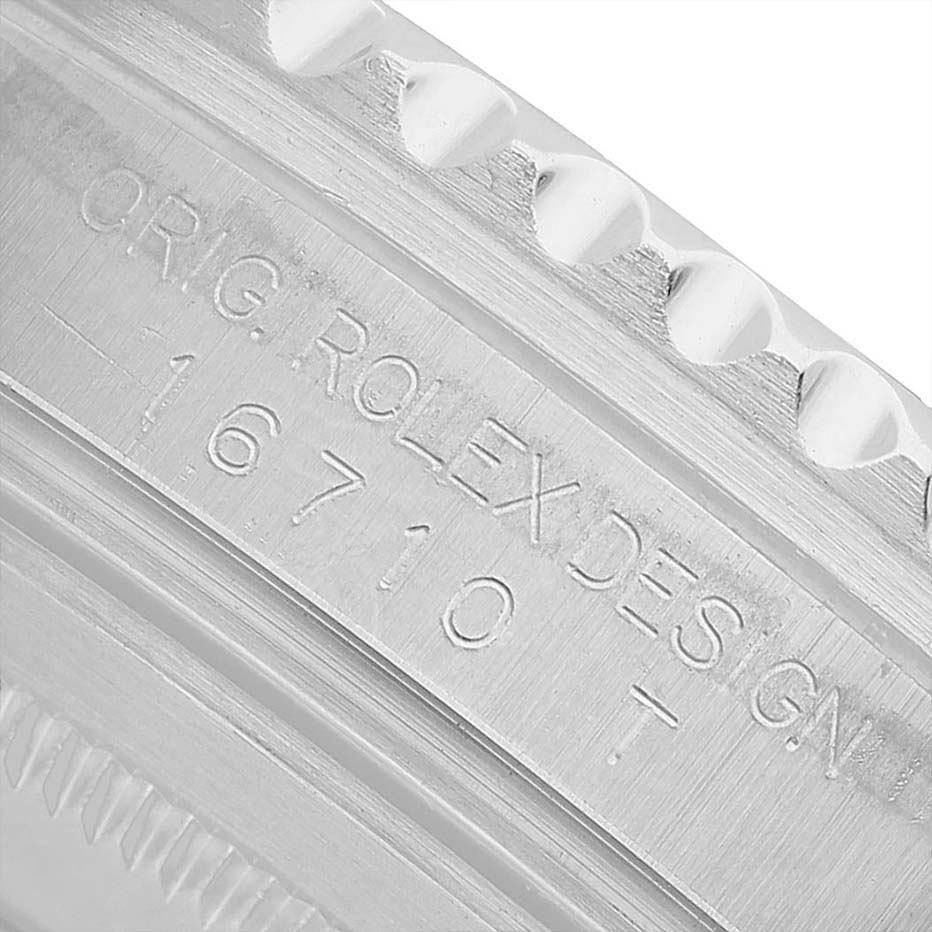 The image shows the side angle of a Rolex GMT-Master 16710 Men's Stainless Steel Black Dial's case with model number engraving.