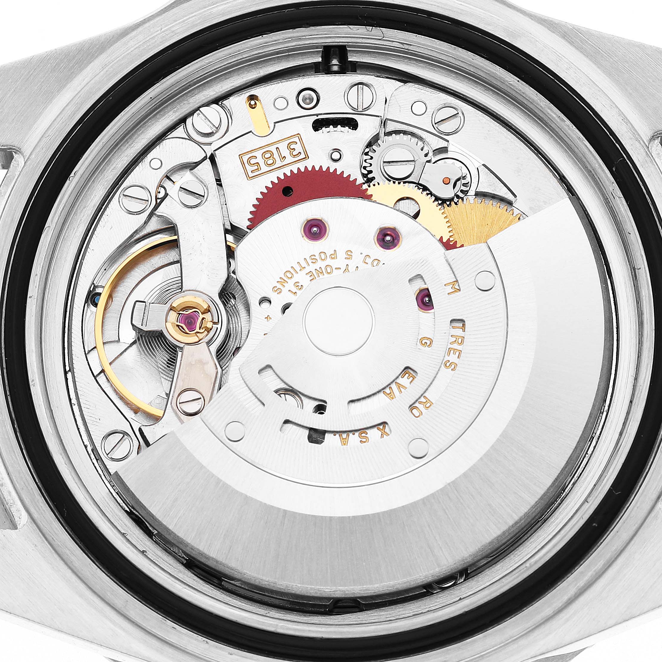 The image shows the inner movement of a Rolex GMT-Master 16710 Men's Stainless Steel Black Dial watch from a top-down angle.