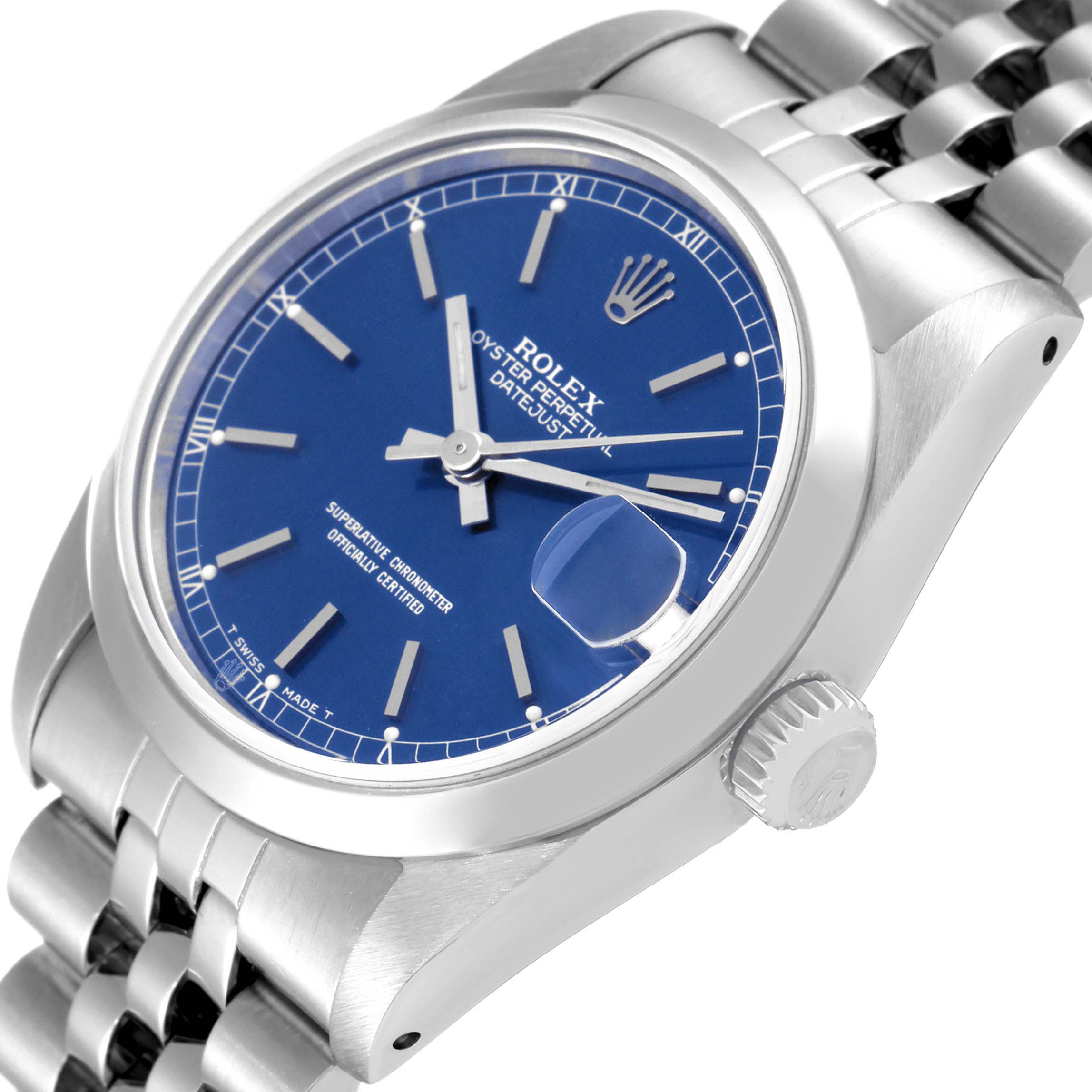 The image shows a Rolex Oyster Perpetual Datejust Mid-Size watch at an angled close-up view, highlighting its blue dial and bracelet.