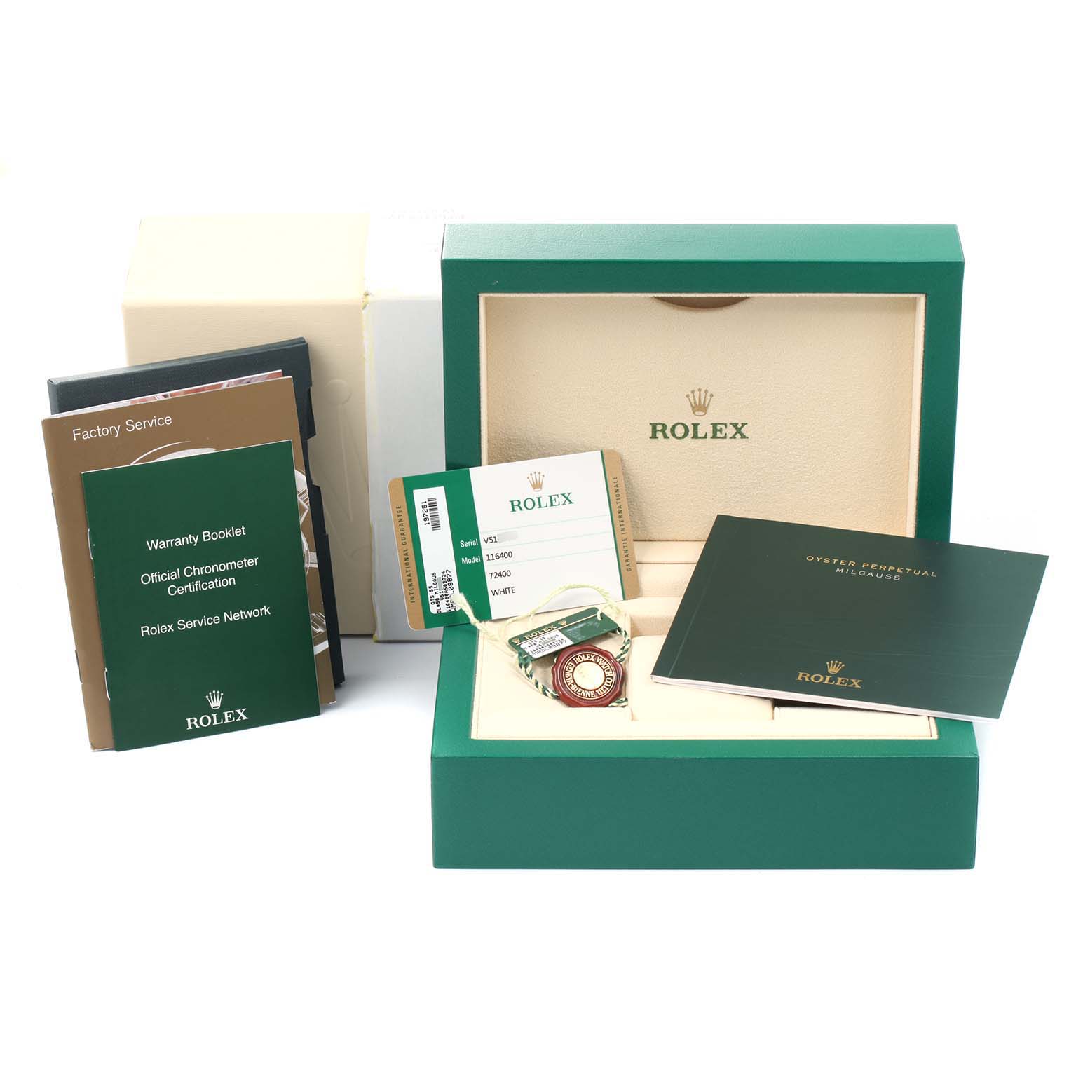 The image shows accessories for the Rolex Milgauss 116400V Men's Stainless Steel White Dial 116400V Men's Stainless Steel White Dial model, including booklets, warranty cards, and a green box from a front angle.