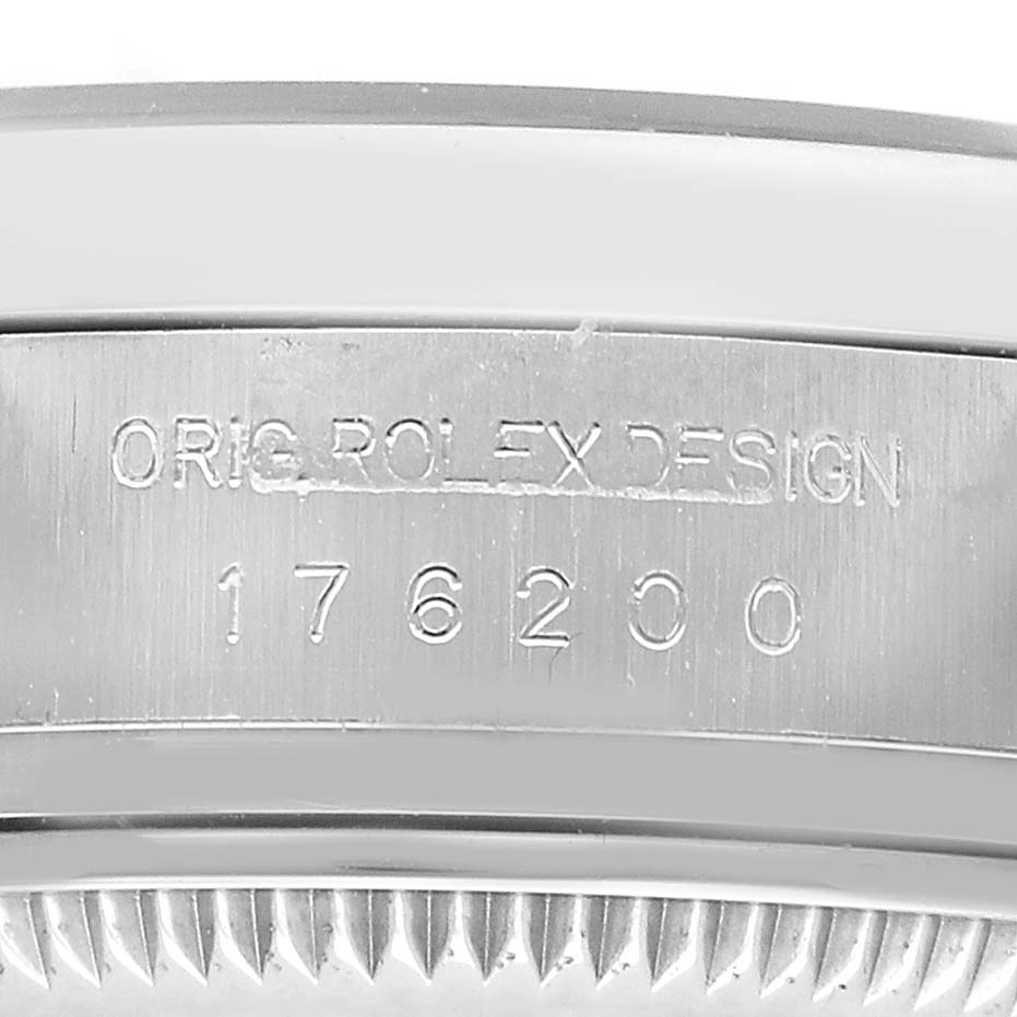 The image shows a close-up of the case side engraving on a Rolex Oyster Perpetual 176200 Women's Stainless Steel Silver Dial watch, displaying the design number.