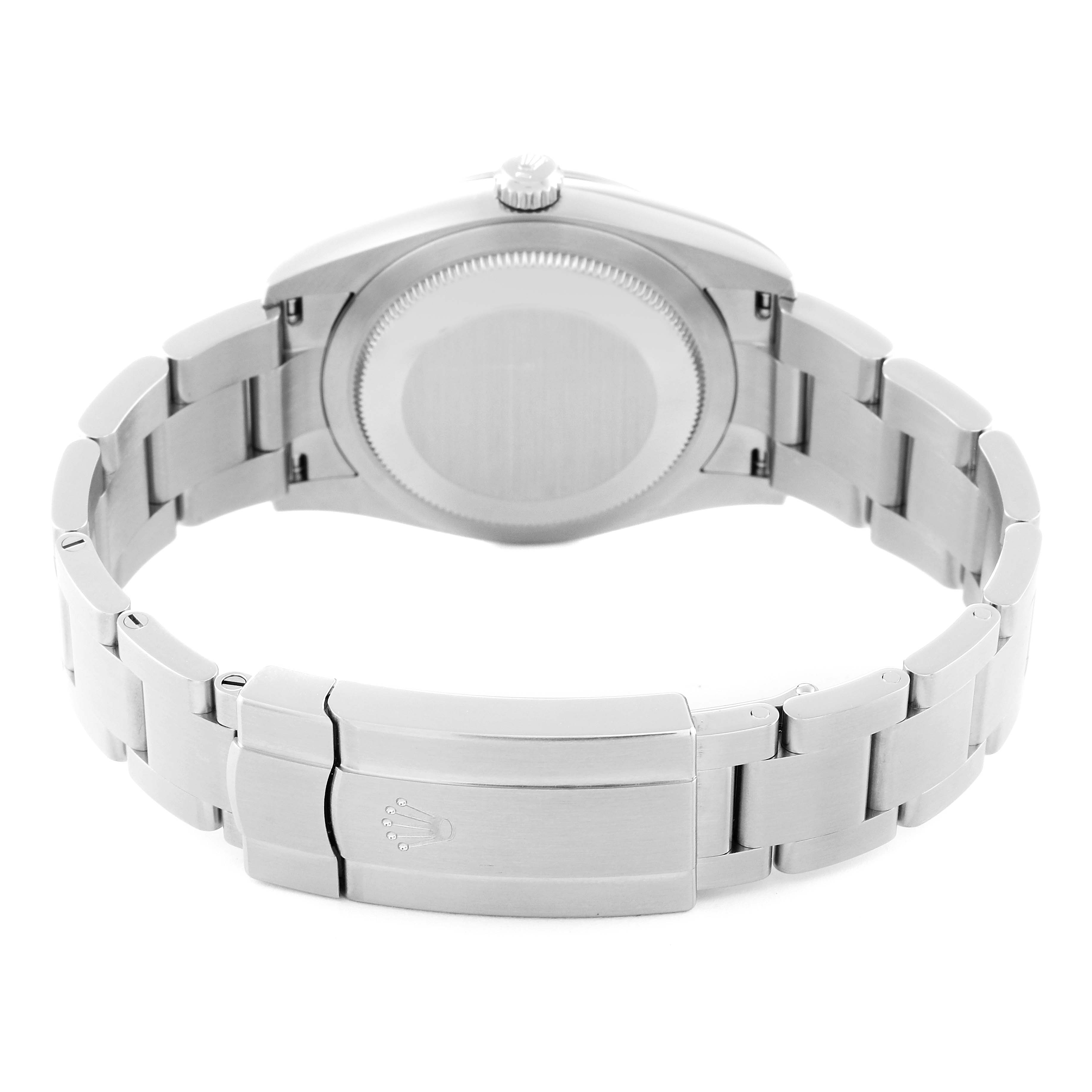 The image shows the back view of a Rolex Oyster Perpetual 124200 Men
s Stainless Steel Pink Dial 124200 Men
s Stainless Steel Pink Dial watch, highlighting its clasp and rear case.