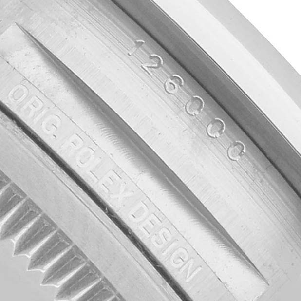 The image shows a close-up of the case back engraving on a Rolex Oyster Perpetual 126000 Men's Stainless Steel Blue Dial watch.