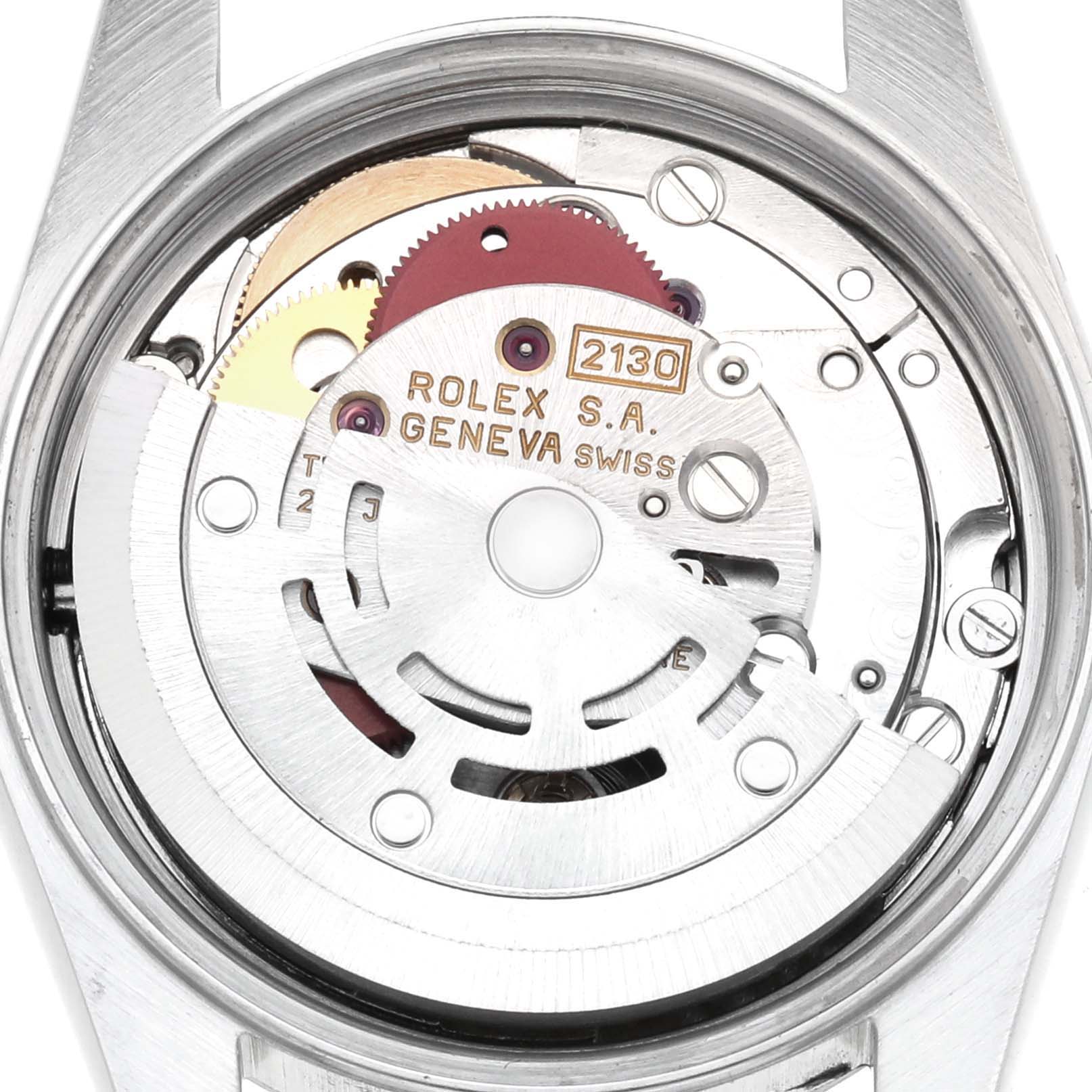 The image shows the back view of a Rolex Oyster Perpetual 67180 Women
s Stainless Steel Black Dial 67180 Women
s Stainless Steel Black Dial, exposing its intricate movement mechanism.