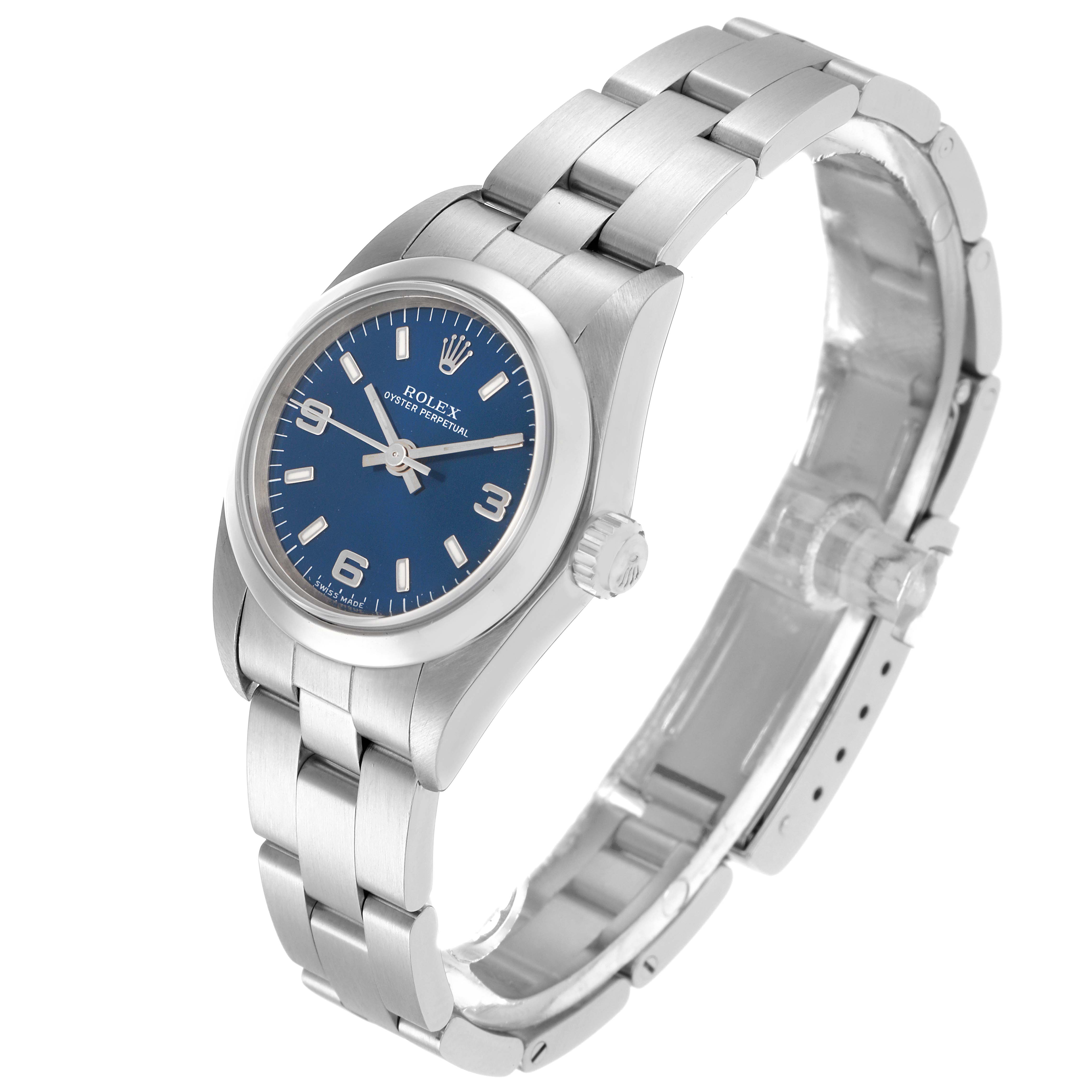 The Rolex Oyster Perpetual 76080 Women
s Stainless Steel Blue Dial 76080 Women
s Stainless Steel Blue Dial watch is shown at a slight angle, highlighting the face, bracelet, and crown.