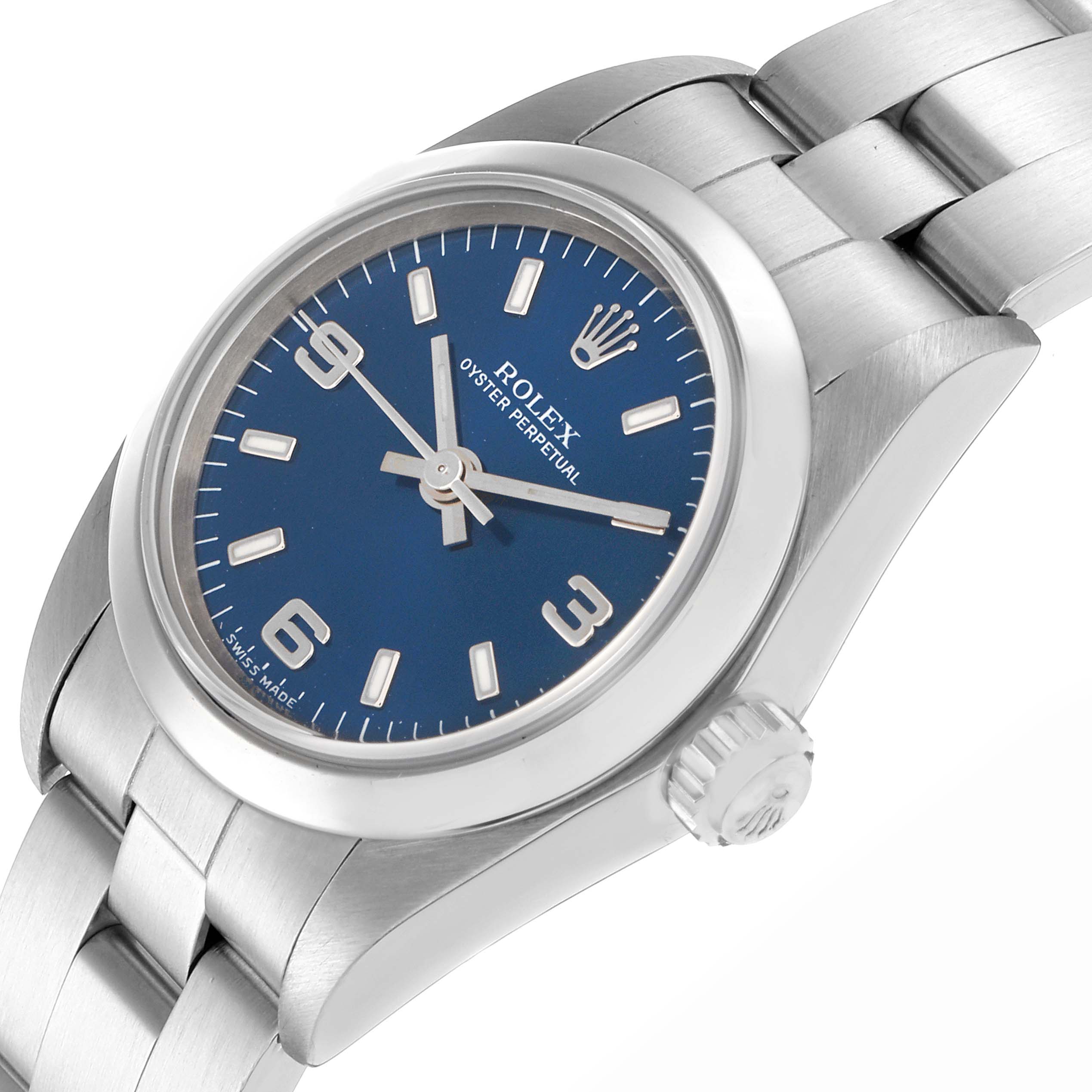 The Rolex Oyster Perpetual 76080 Women
s Stainless Steel Blue Dial 76080 Women
s Stainless Steel Blue Dial watch is shown from an angled view, highlighting the dial, bezel, crown, and part of the bracelet.